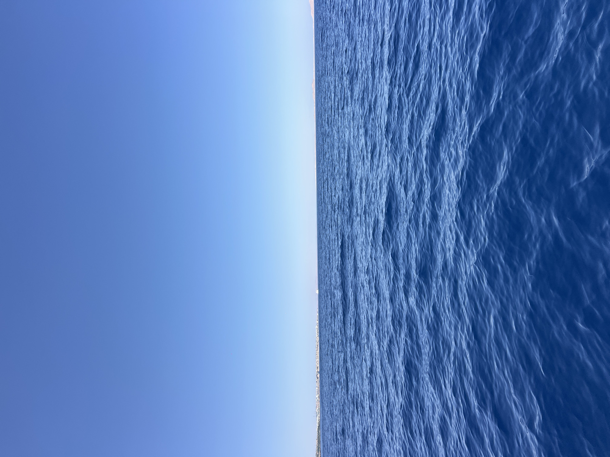 Boat ride off the Sharm El Sheikh coast, city in view