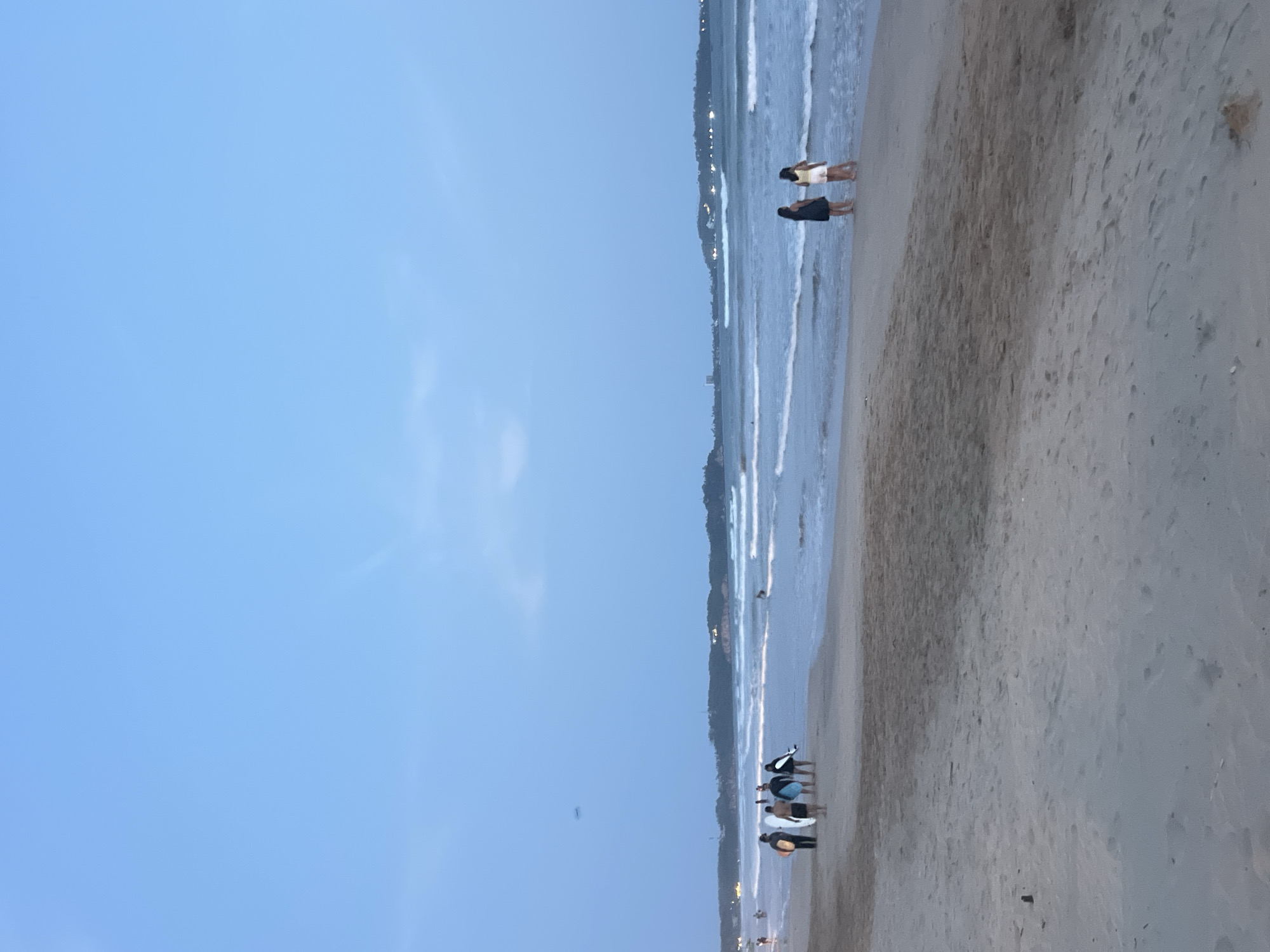 Evening beach gathering draws families, surfers to Peleana shores