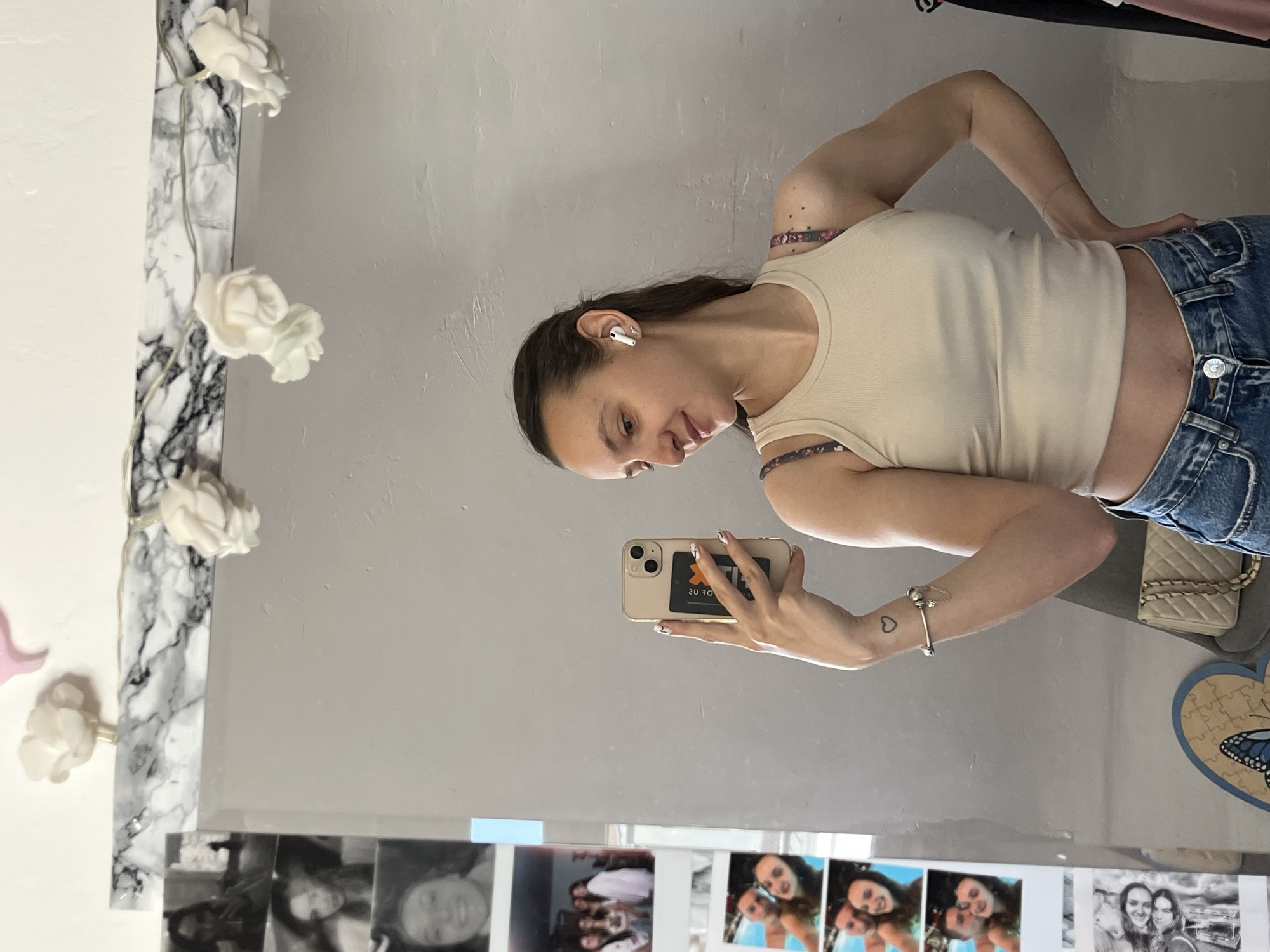 Woman Takes Multiple Mirror Selfies in Saarbrücken Morning