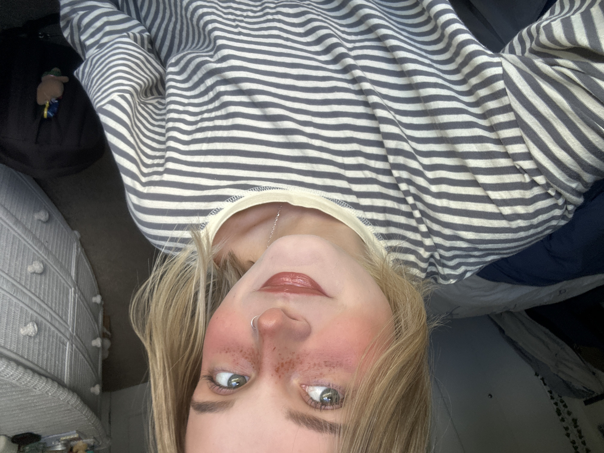 Upside-down selfie captured in Whistler shows blonde individual with nose ring