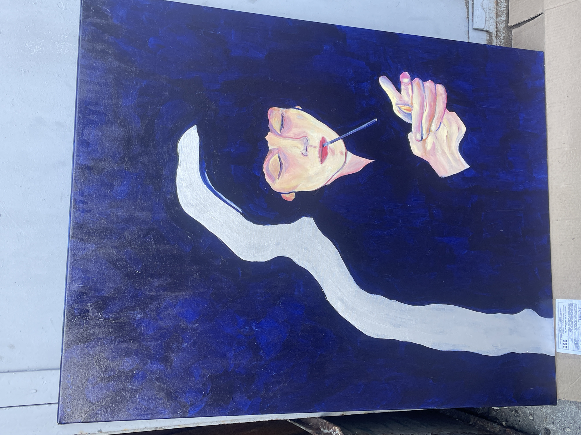 Artistic painting of floating figure with cigarette documented in Yerevan