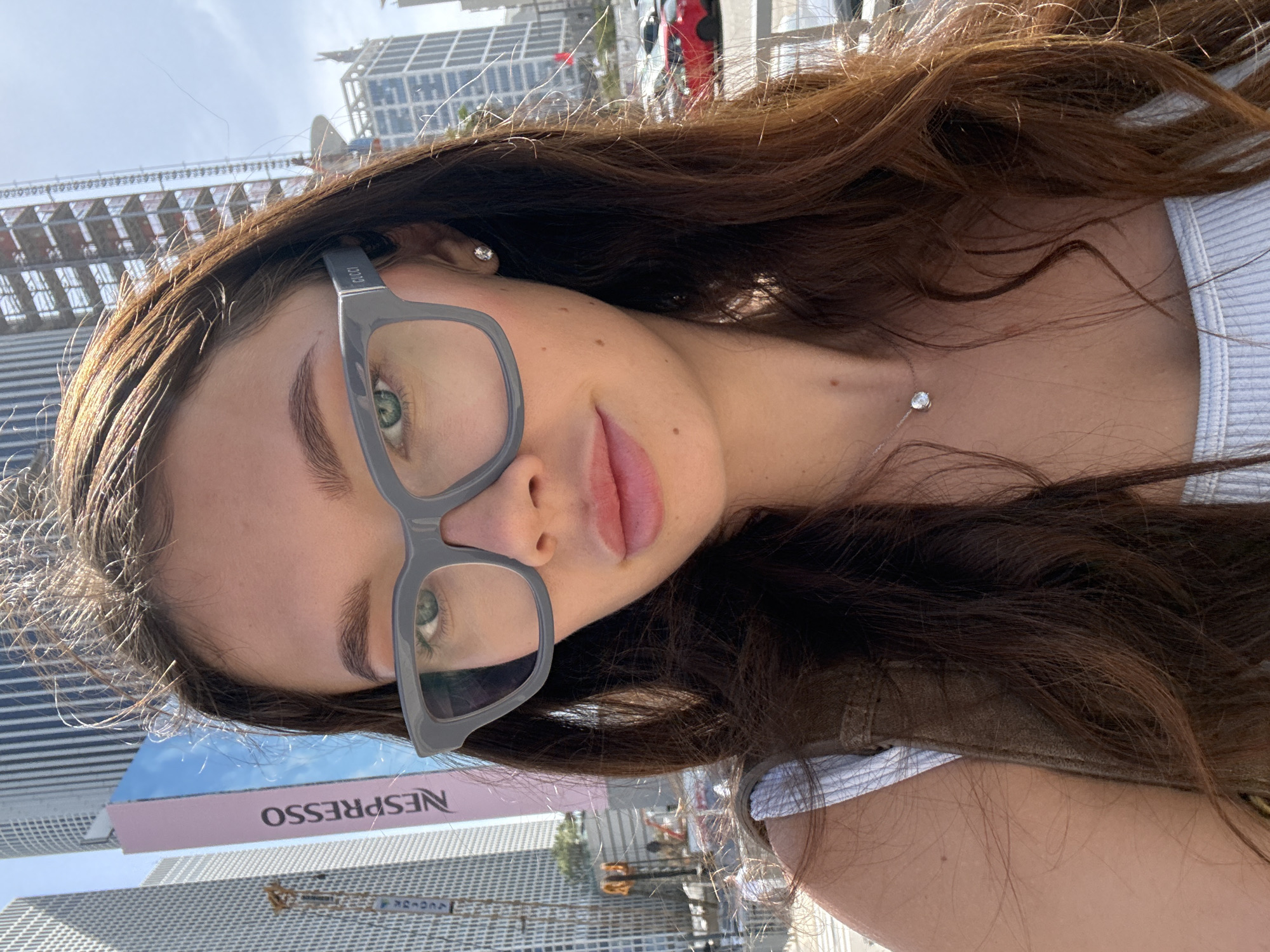 Woman in white top spotted outdoors in Tel Aviv