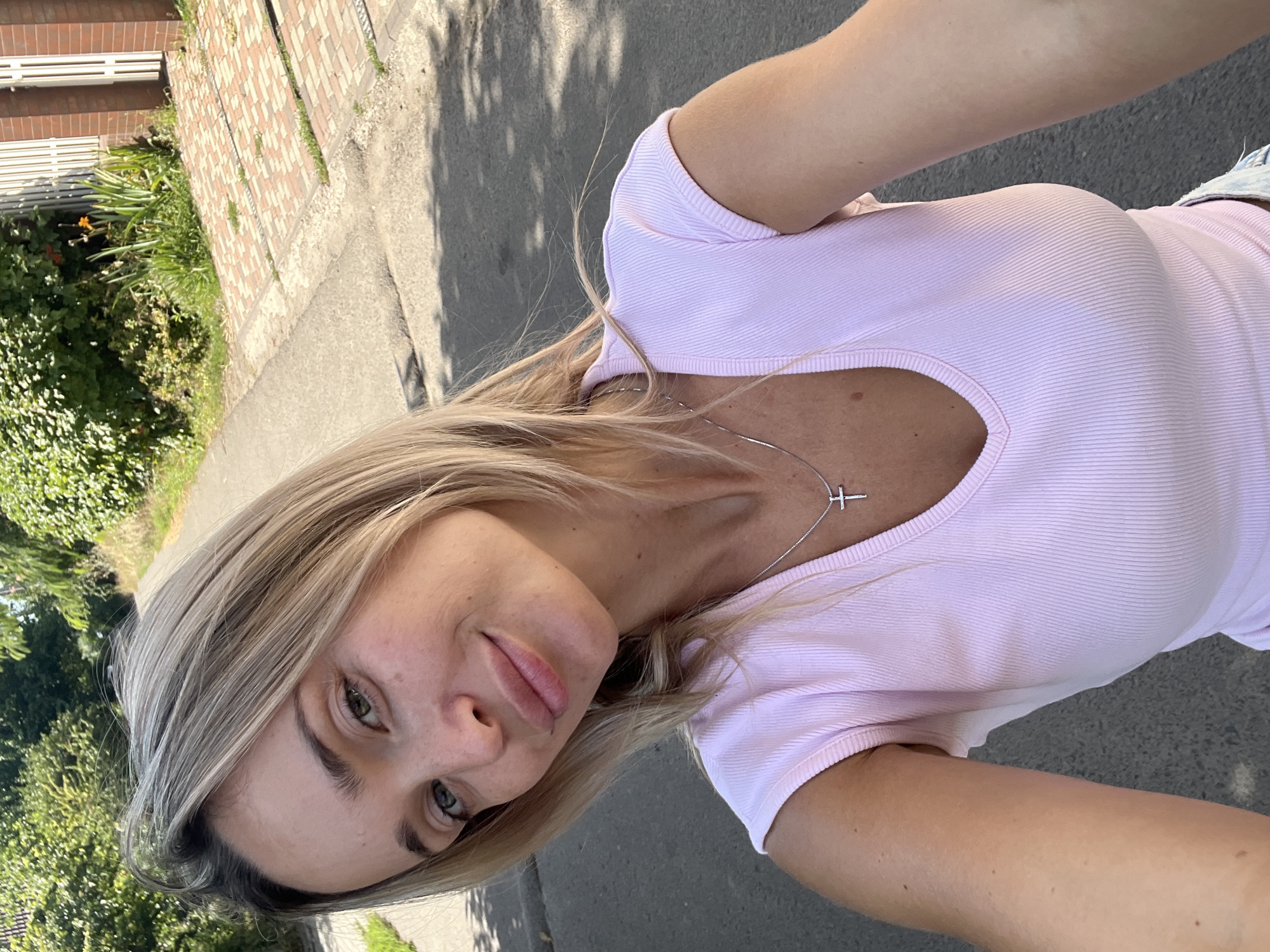 Outdoor selfie and evergreen branch detail, same minute