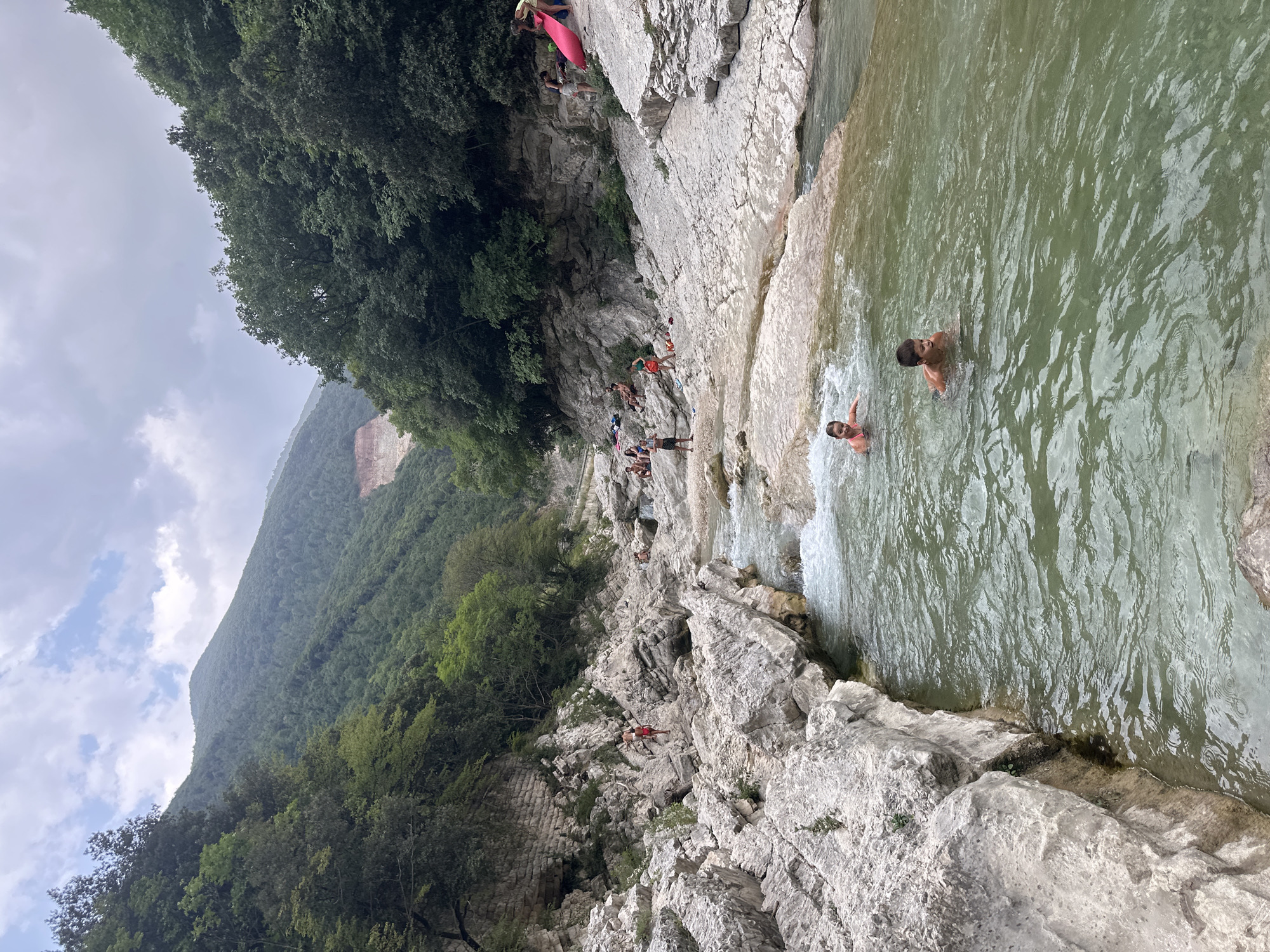 Swimming and wading in a rocky river gorge near Cagli