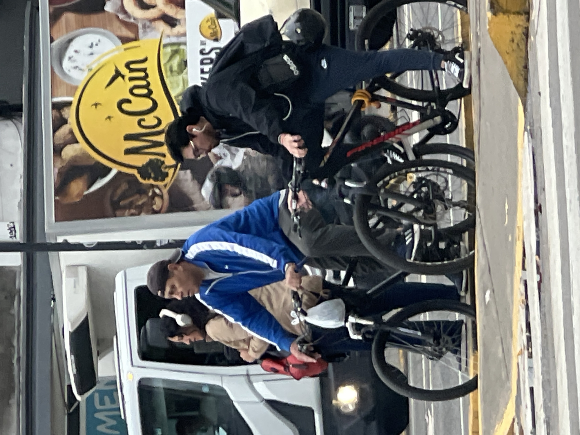 Pedestrians and cyclists share Buenos Aires street intersection