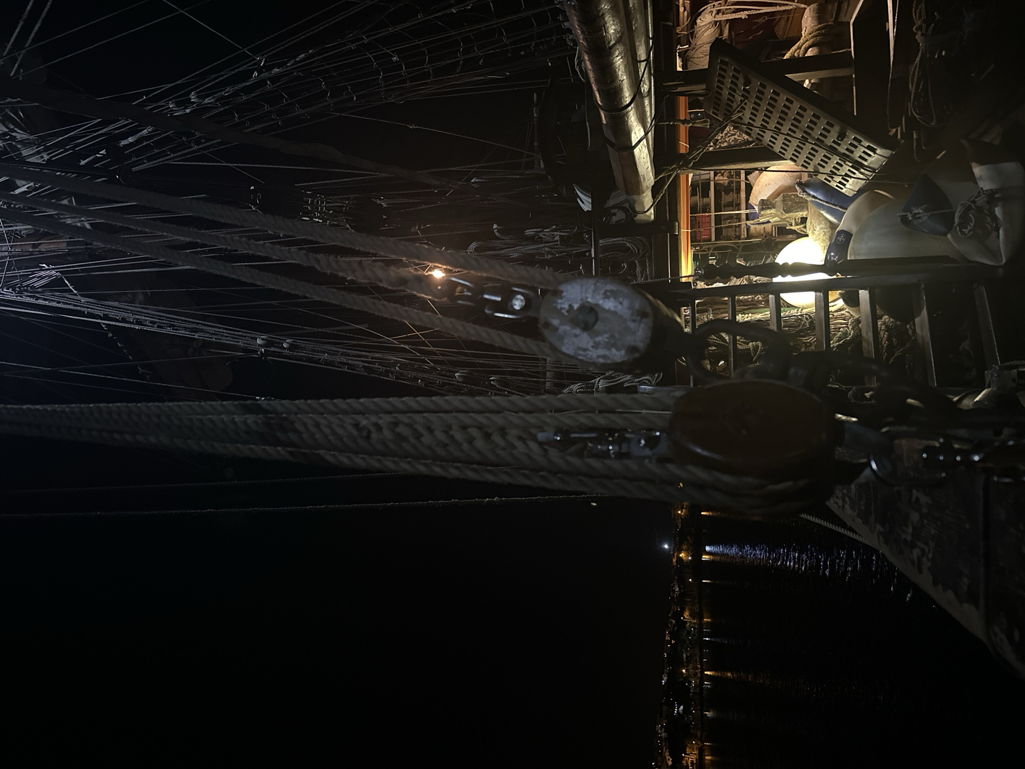 Tall ship Çamlık photographed at night dock in Datça