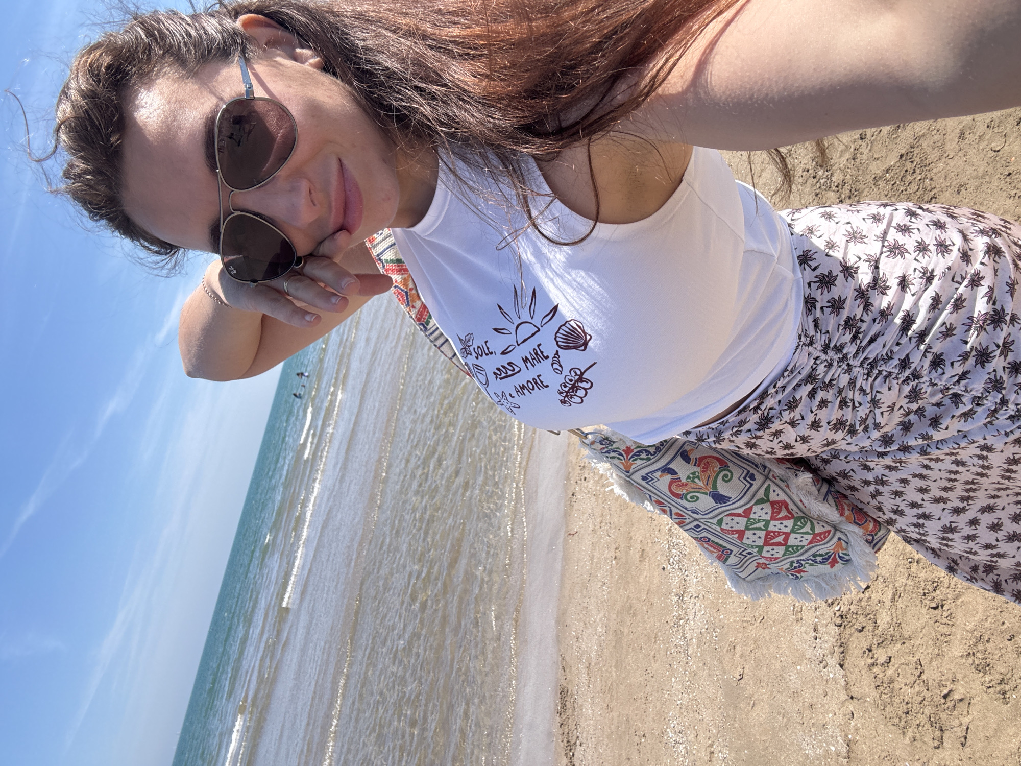 Woman enjoys clear weather on Valencia beach