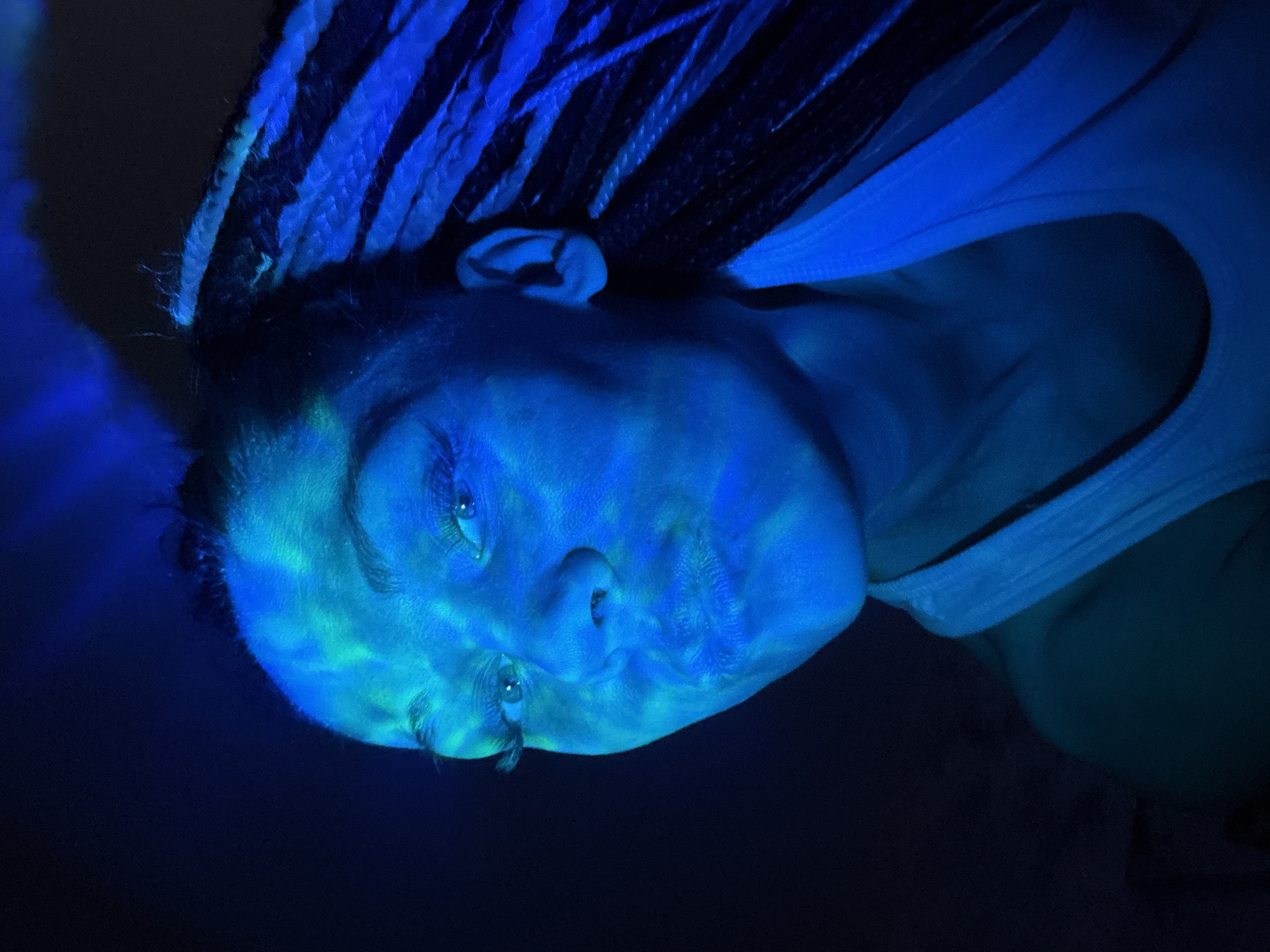 Woman photographed in colored light portraits in Rusanovo