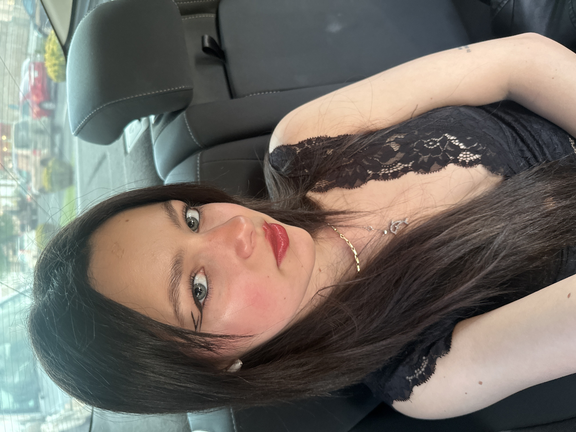 Woman photographed in vehicle interior in Yerevan