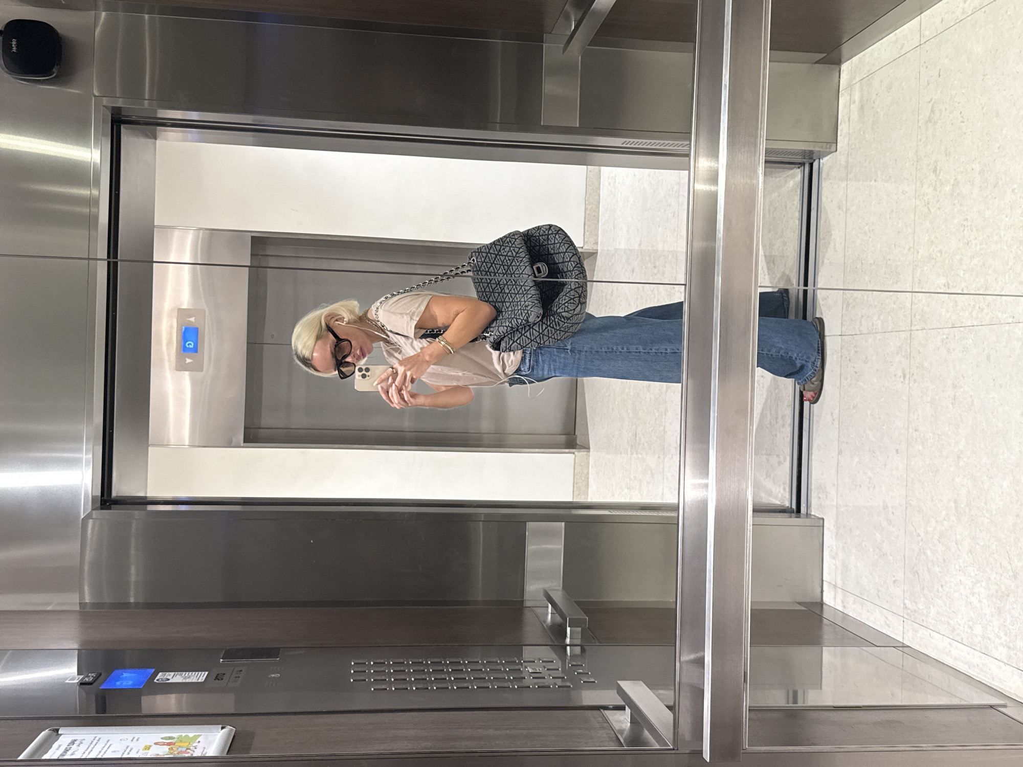 Person takes elevator selfie in Dubai