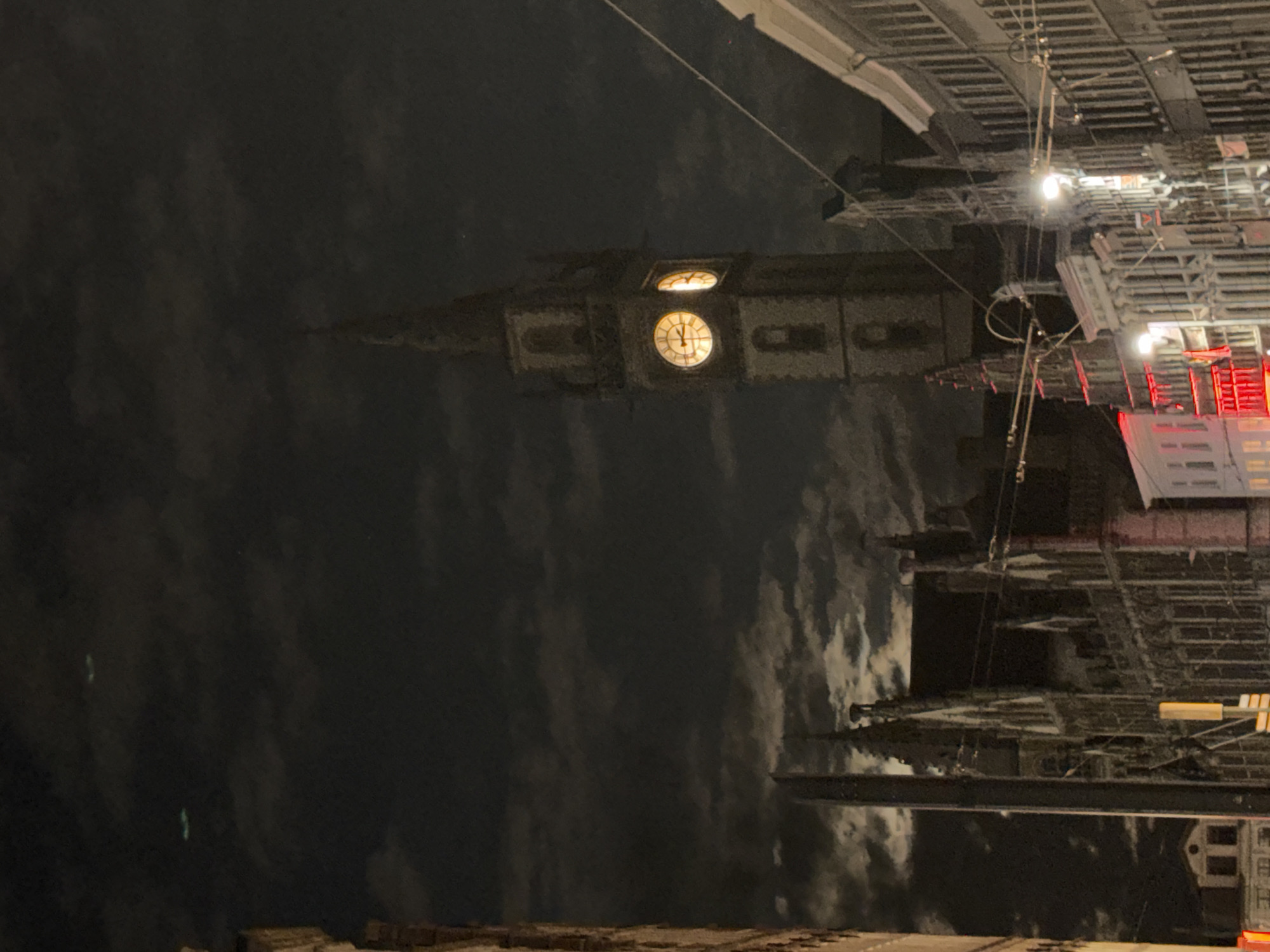 Ghent's medieval center glows under a full moon