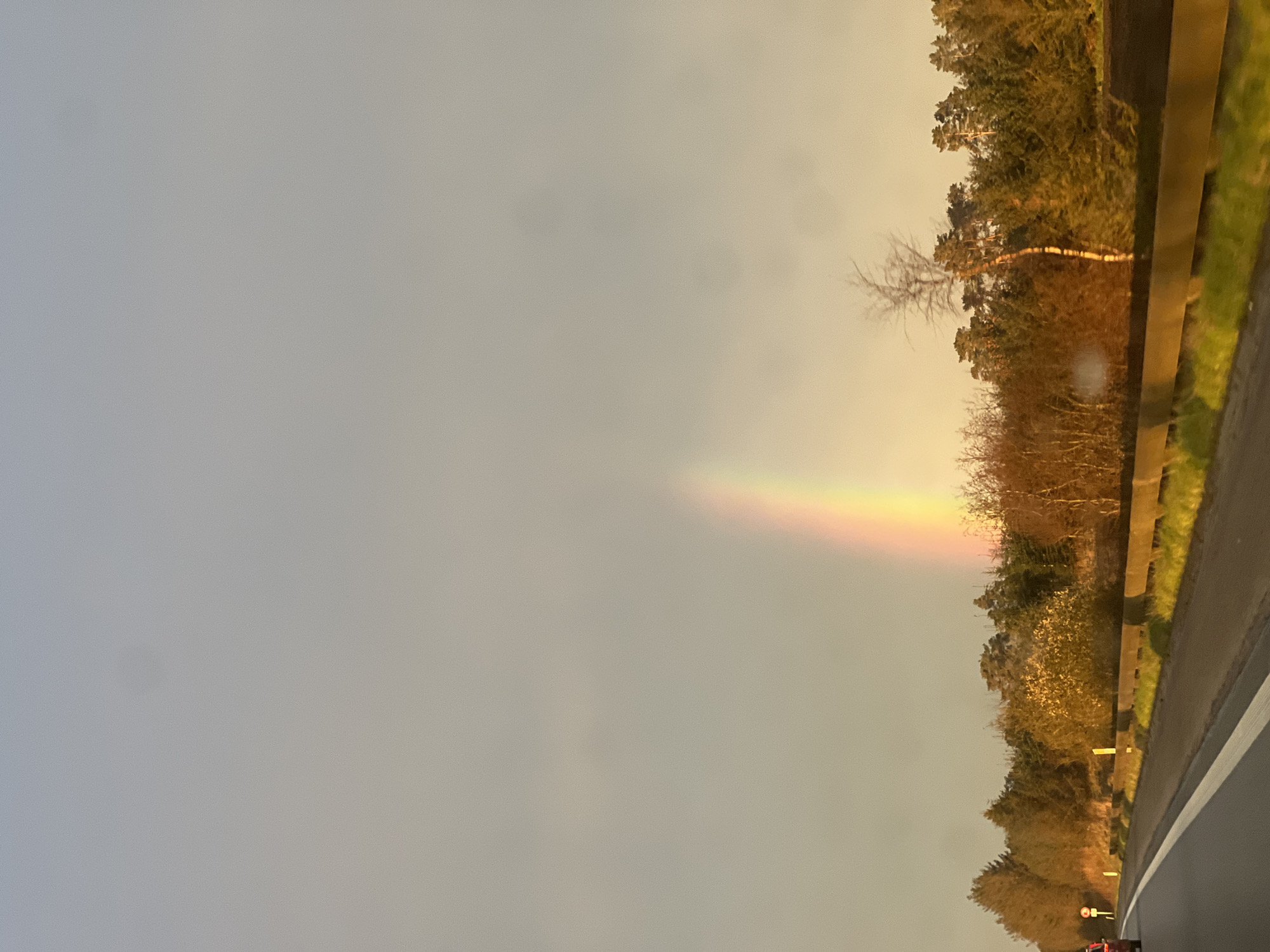 Partial rainbow spotted over highway in Ellidshøj, Denmark