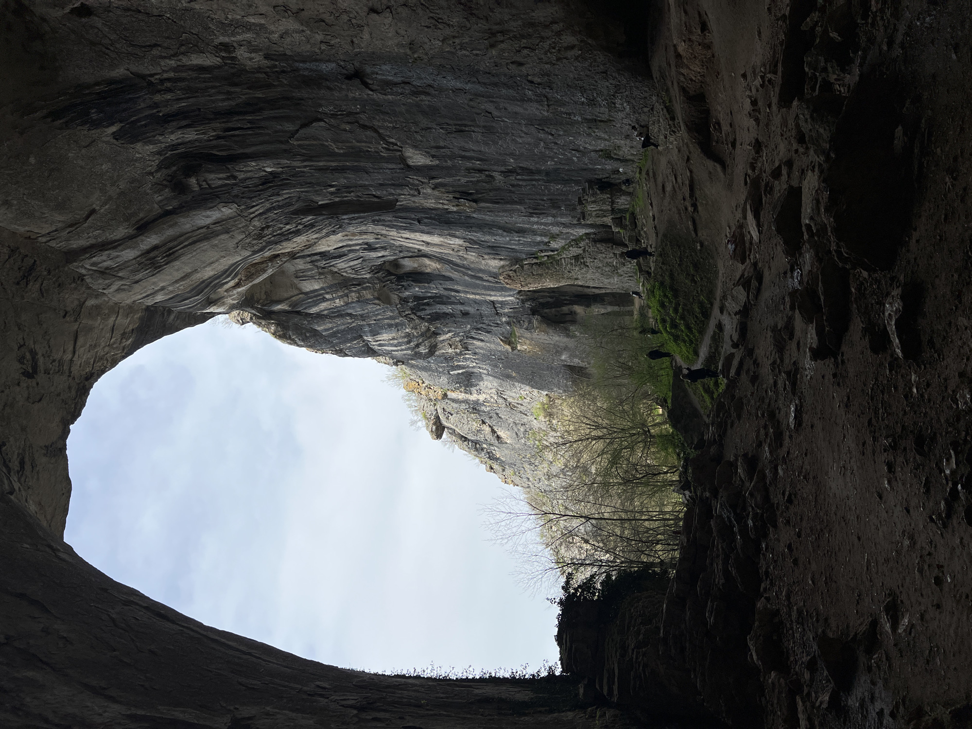 Tourist captures geological formations inside Devetashka Cave, Bulgaria
