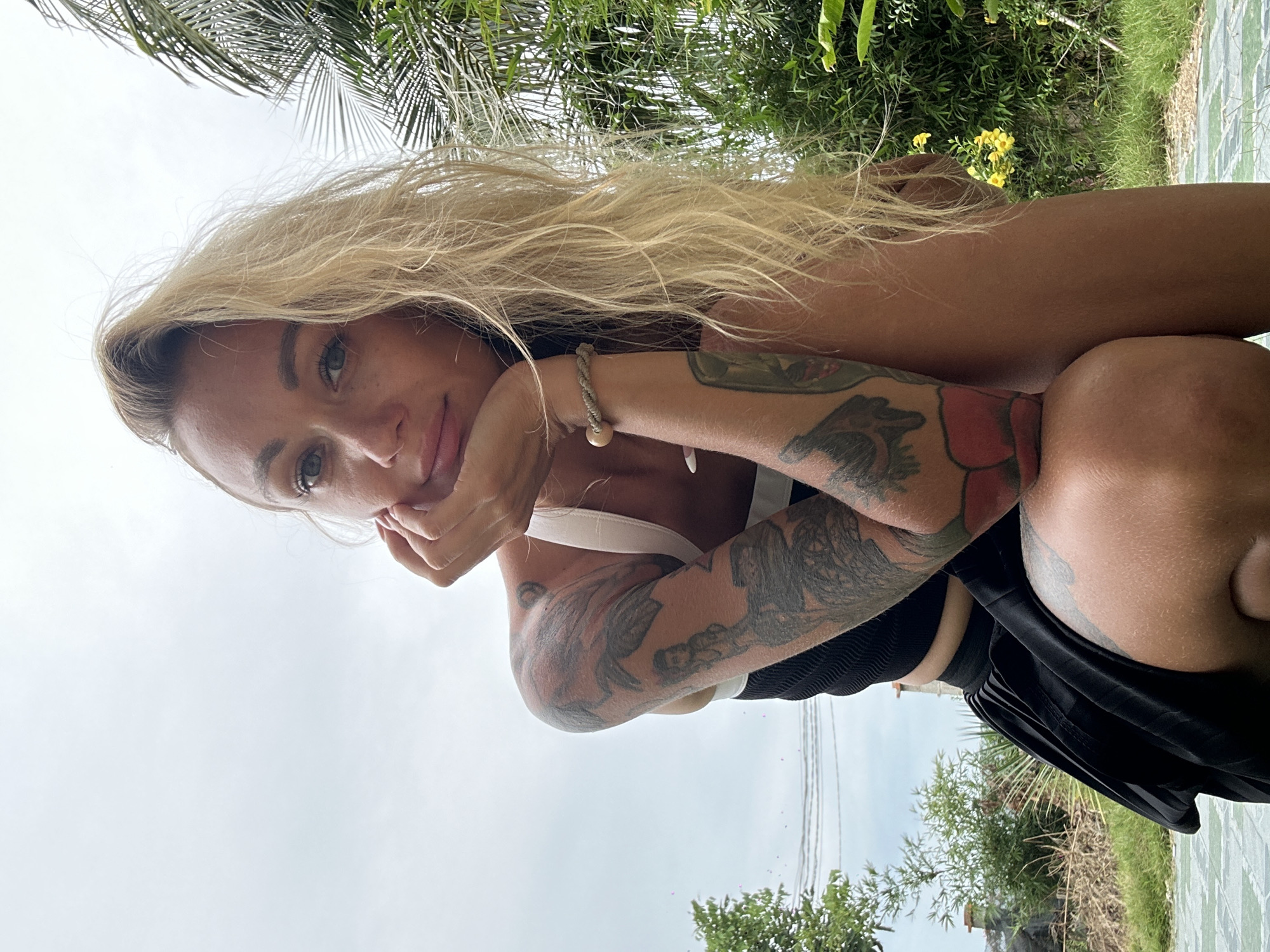 Posing and selfies in a tropical Mũi Né garden