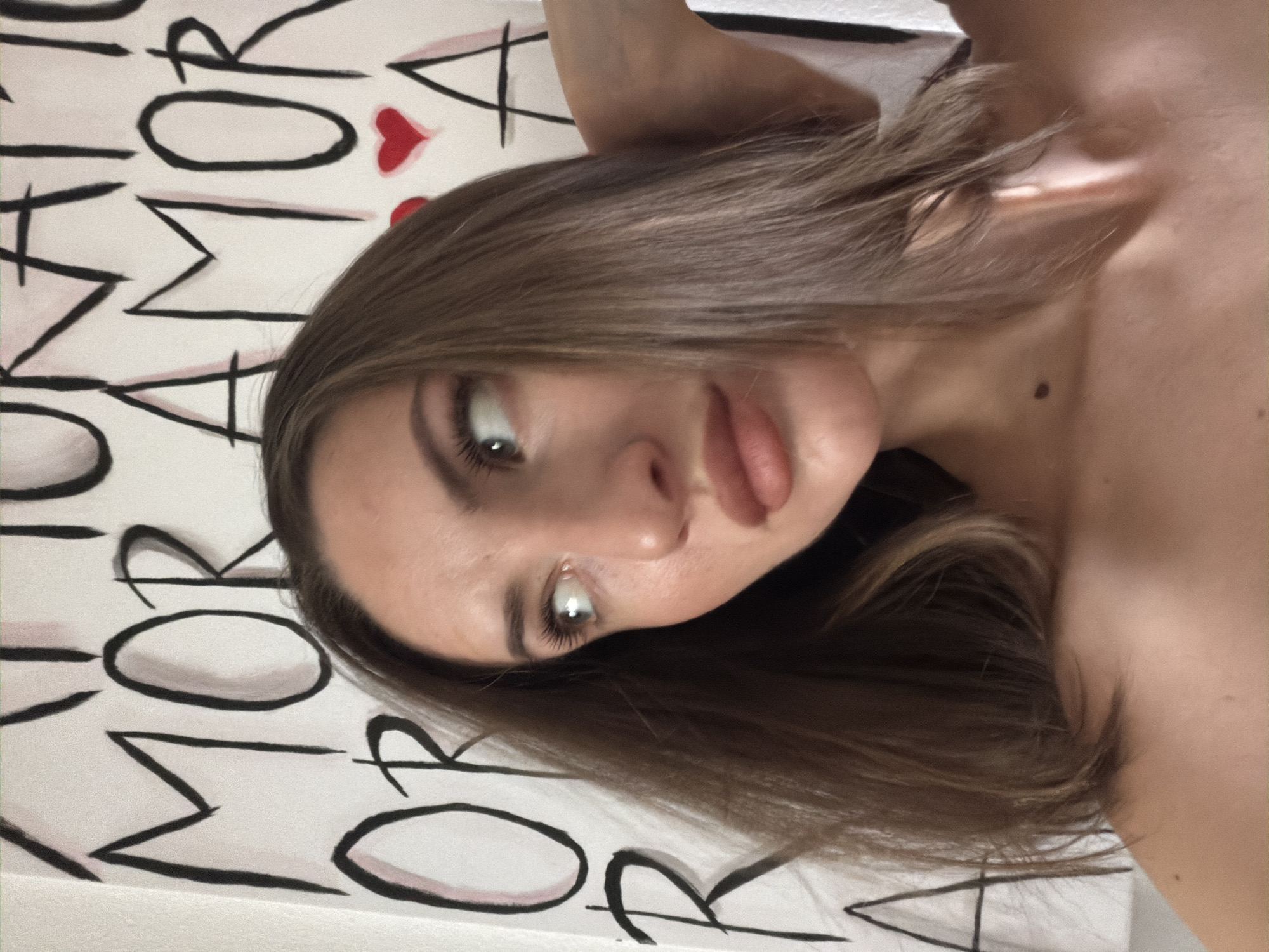 Painted wall mural with red hearts and bold lettering, Sharm El Sheikh