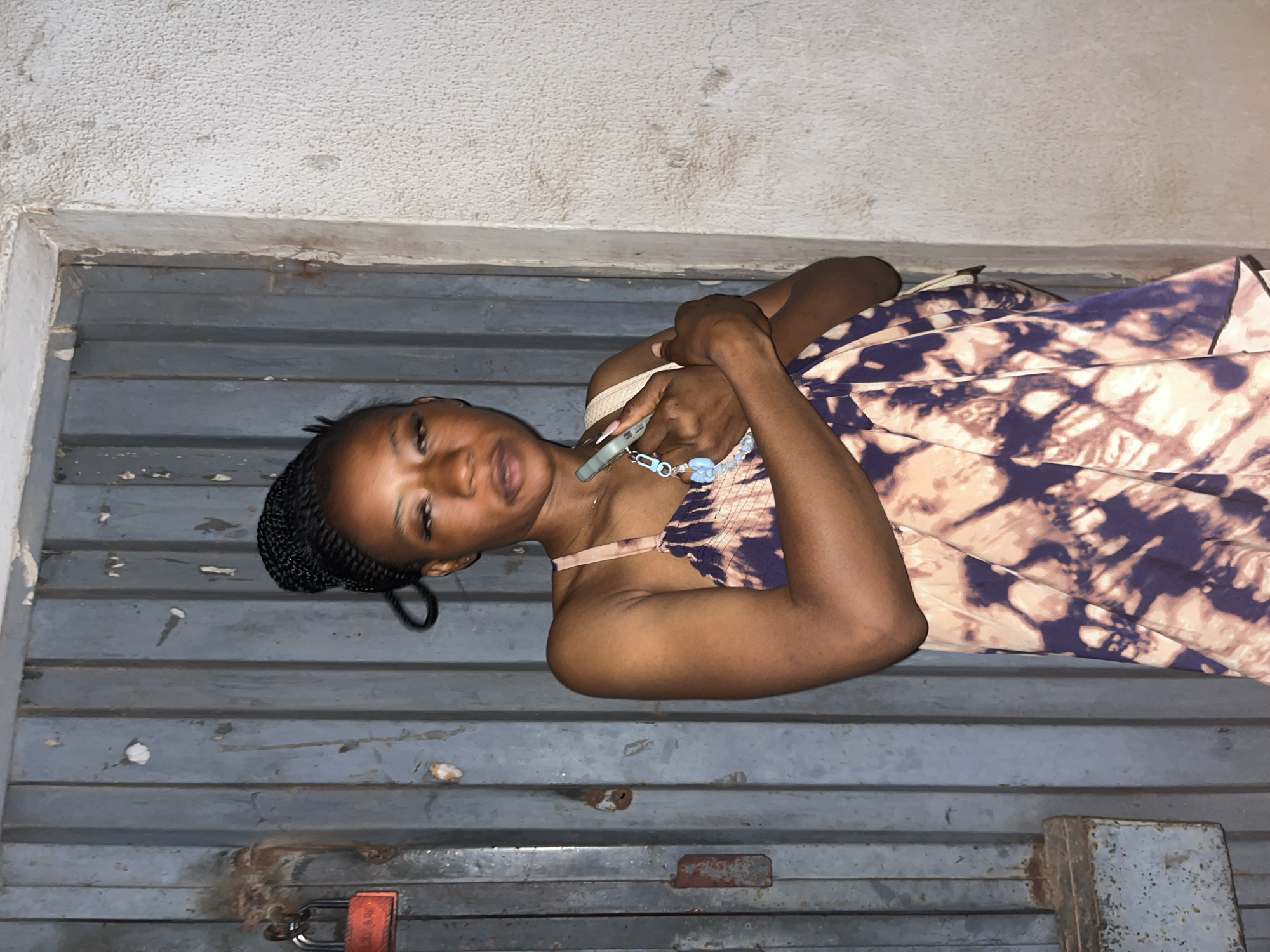 Late-night photos outside a metal gate in Jos, Nigeria