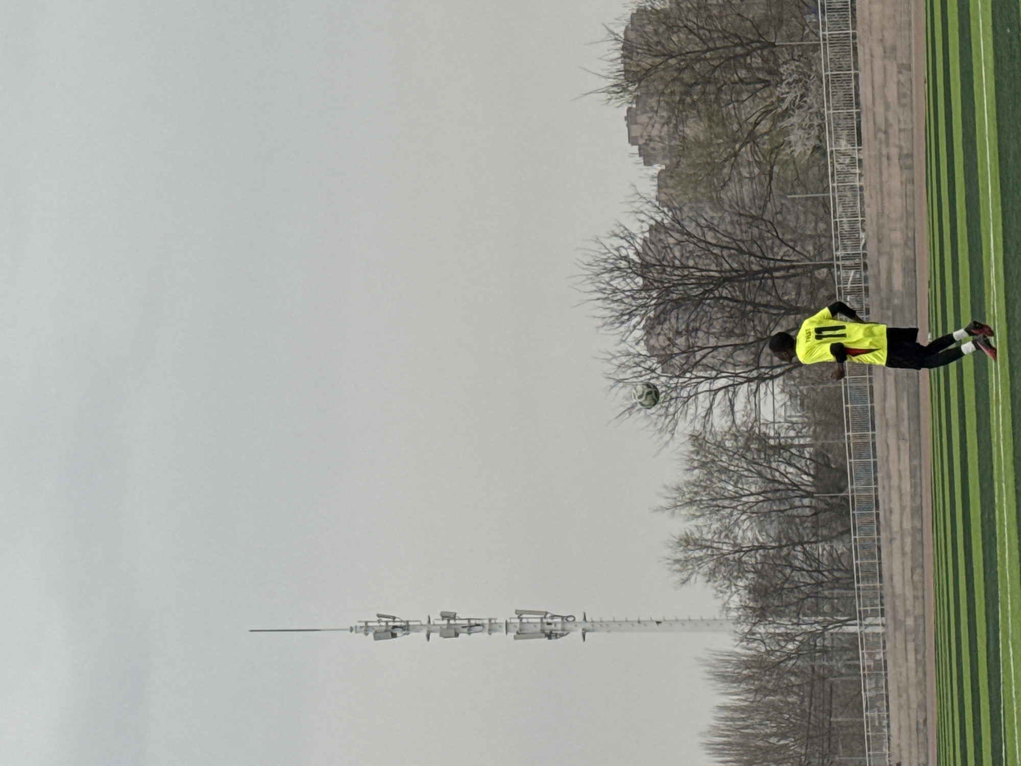 Soccer practice draws phone-wielding spectators at Linghe athletic field