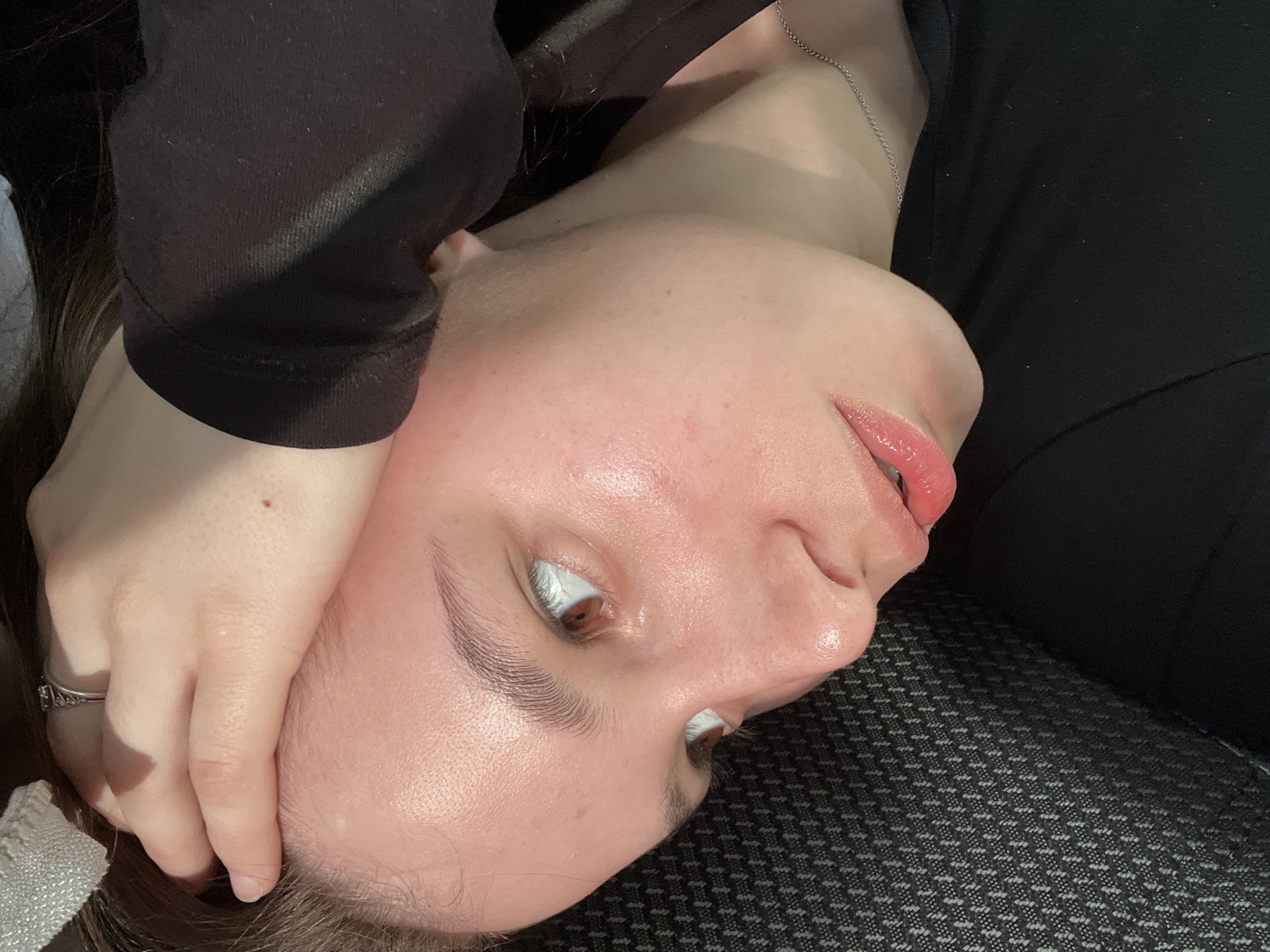 Person captured resting with hand on forehead in Chaikovsky