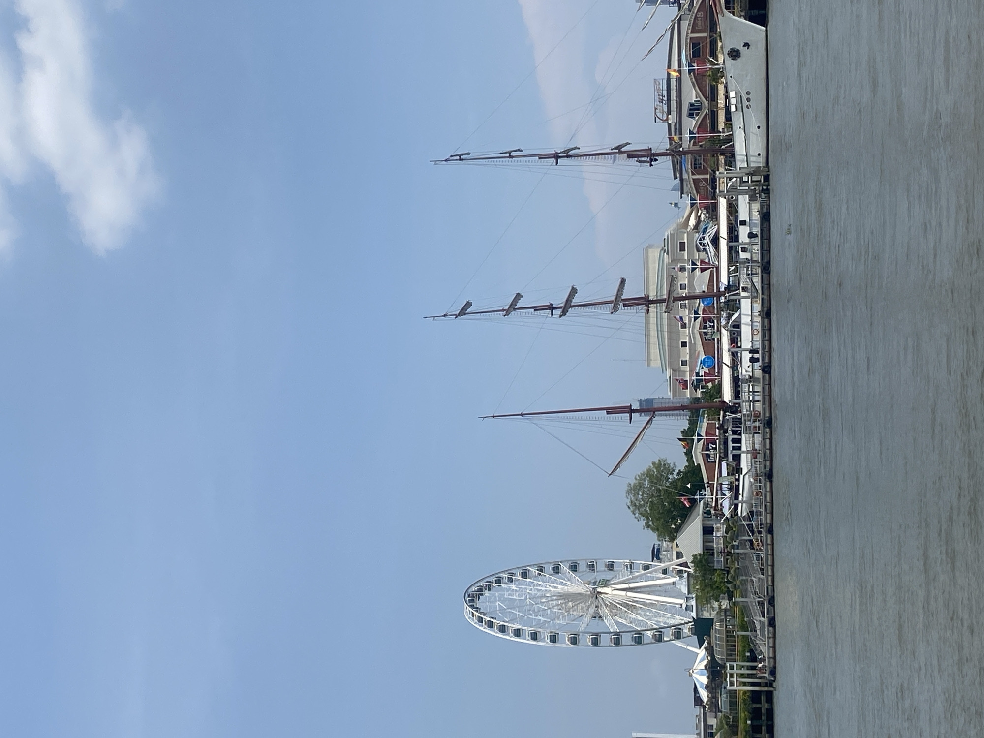Tourist documents ferry ride along Bangkok's Chao Phraya River