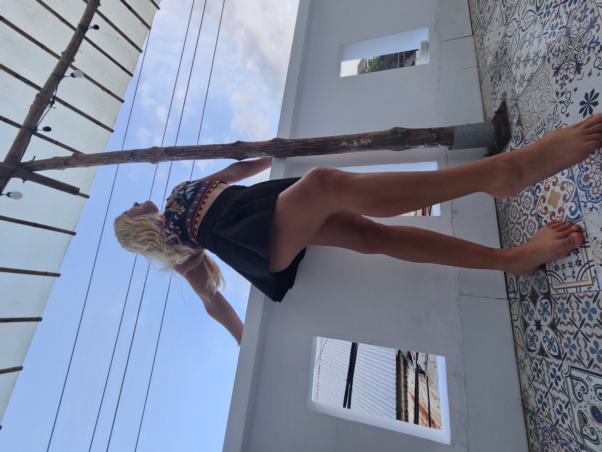 Balcony photo session overlooking coastal Phu Thuy Ward, Vietnam