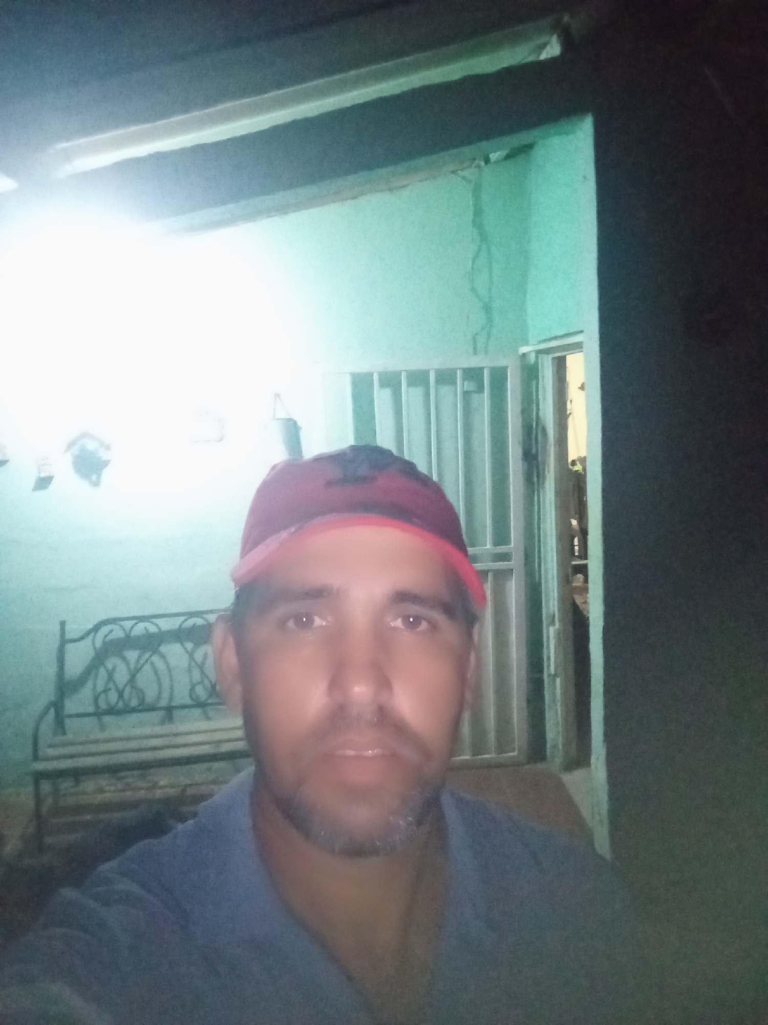 Woman takes selfies on sunny afternoon in Juan Griego