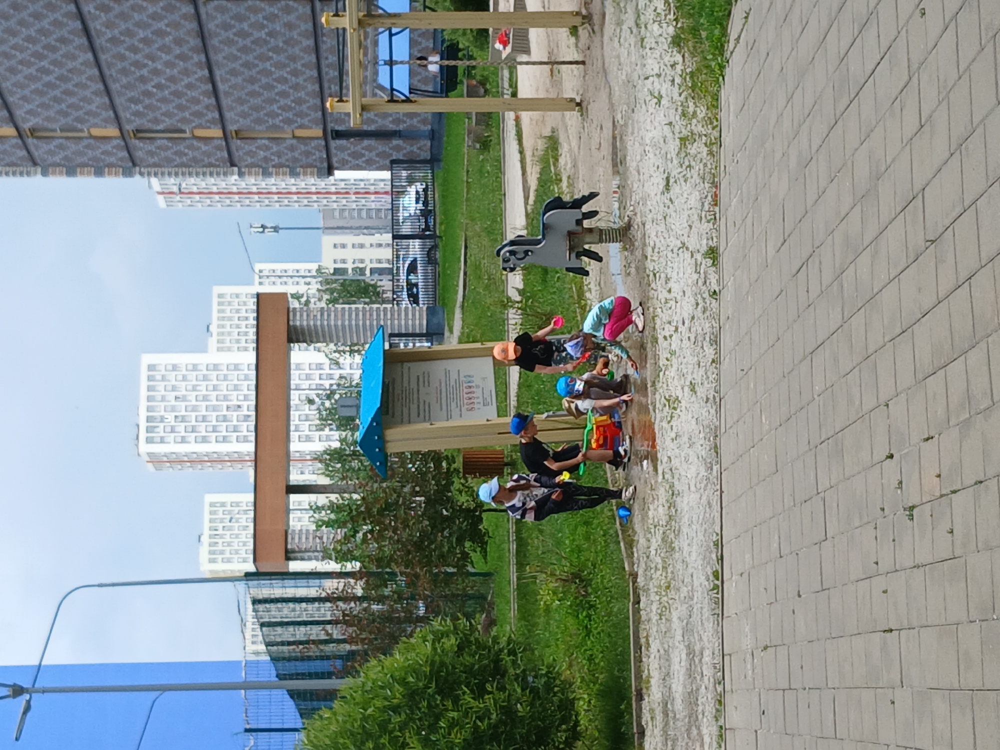 Morning playtime at Yekaterinburg residential complex after rain