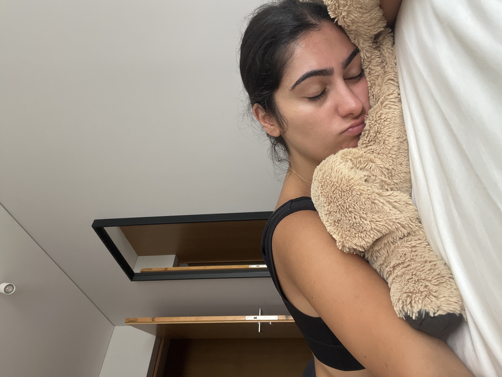 Relaxing in bed with a stuffed animal, Porto
