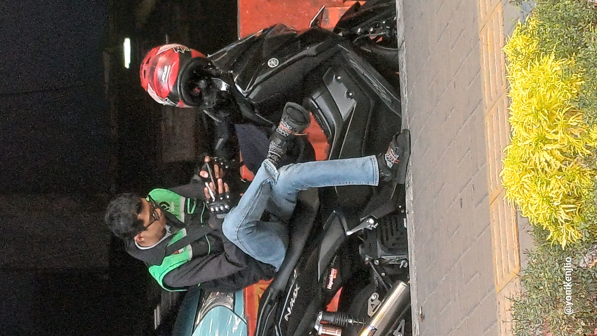 Street-level activity near a South Jakarta overpass on a weekday morning