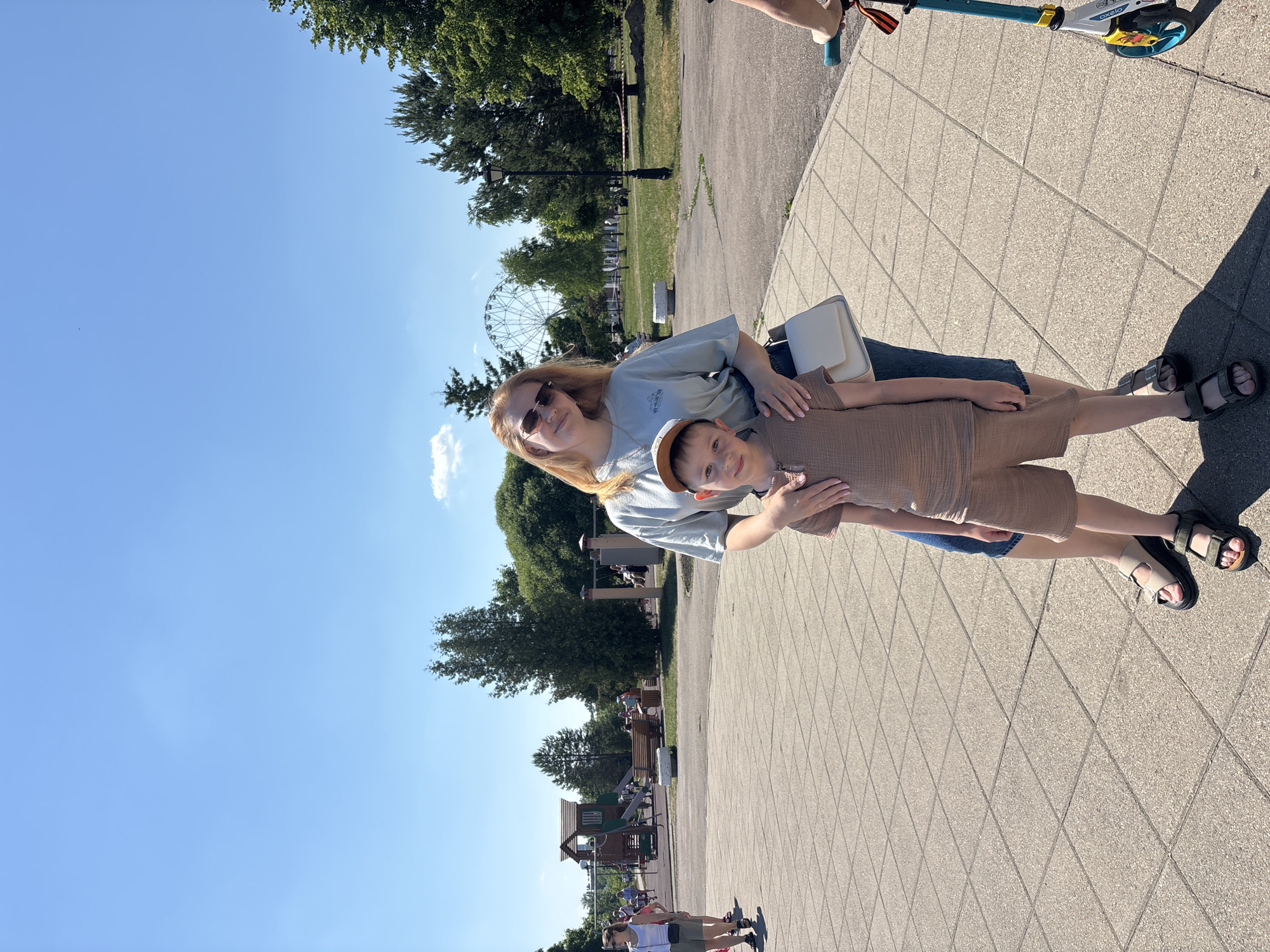 Family enjoys sunny day at Rusanovo amusement park
