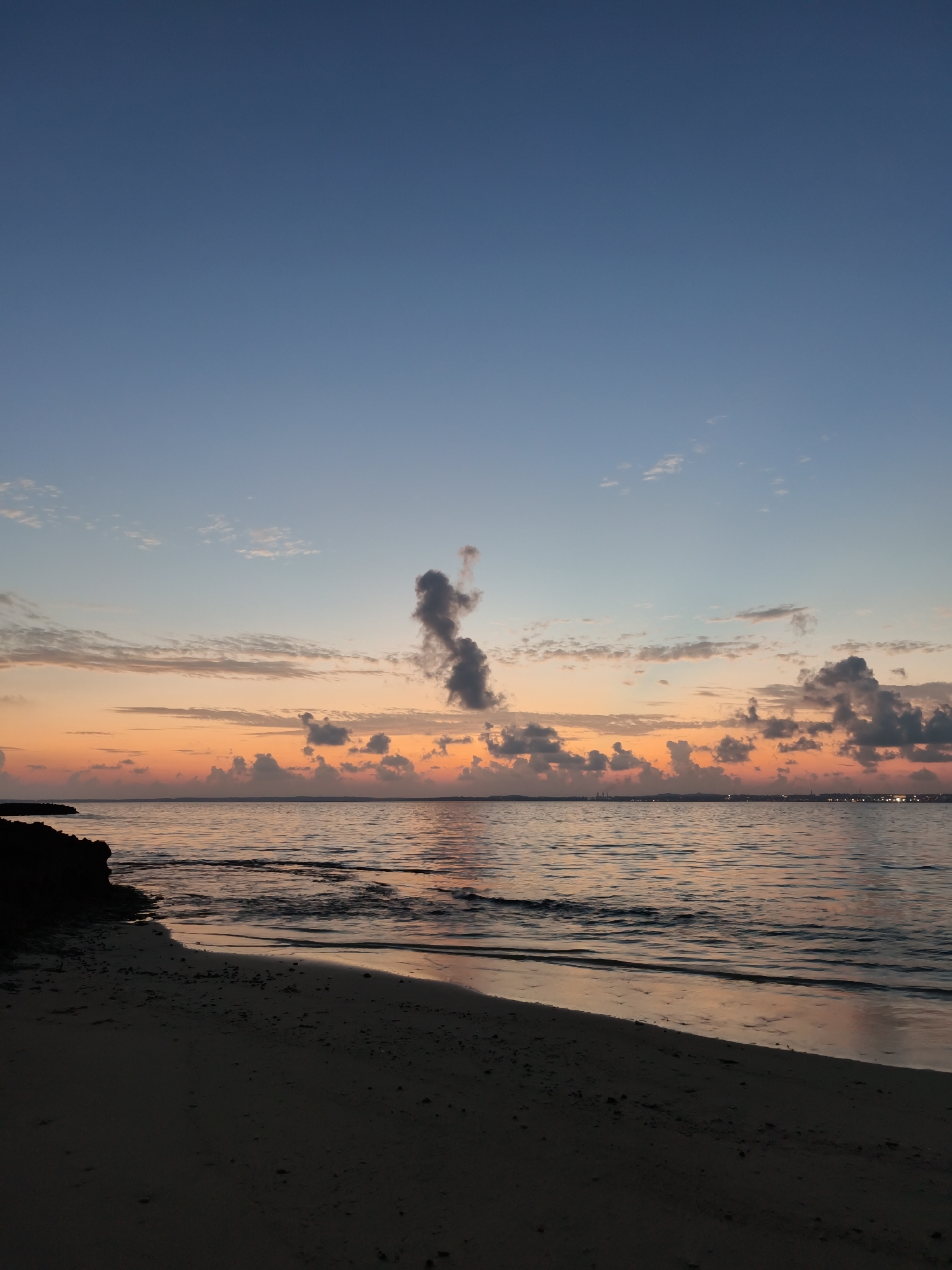 Sunrise or sunset colors over a Miyakojima beach