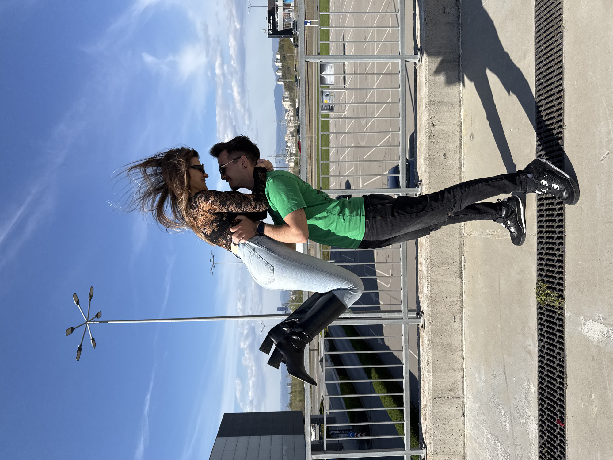 Couple embraces in sunny Sofia amid spring gardens