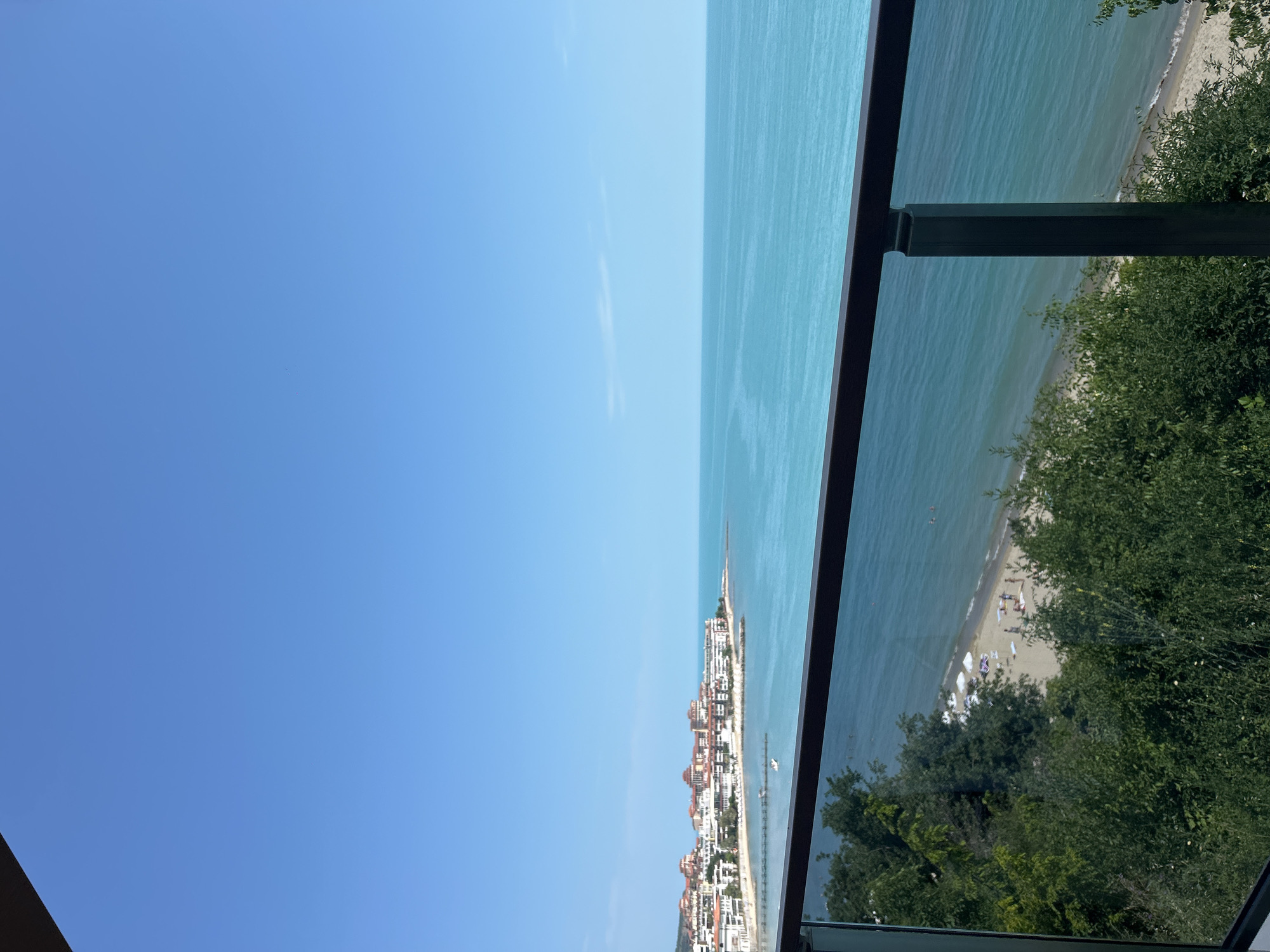 Coastal balcony views and bedroom moments captured by witness