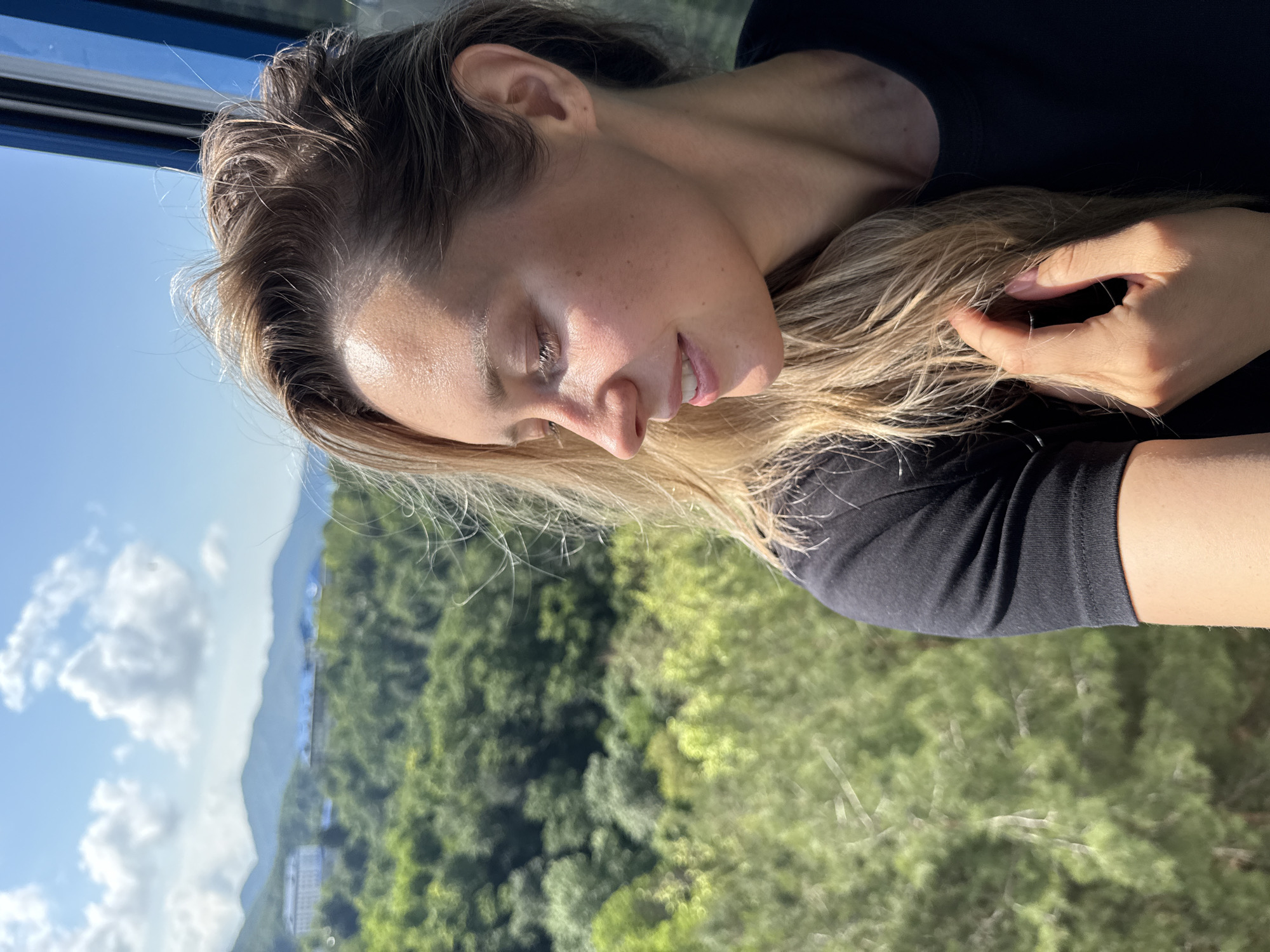 Woman enjoys morning selfie session in coastal Nebug, Russia