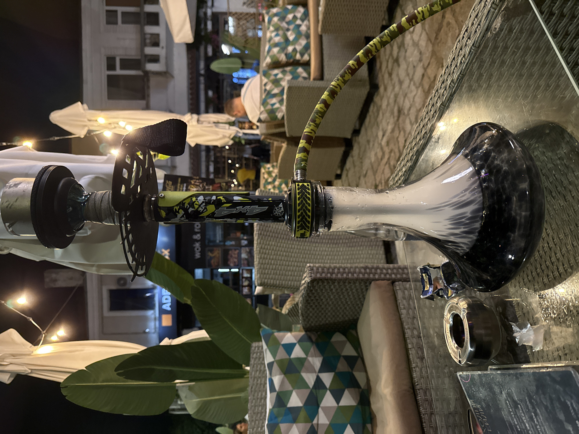 Nighttime hookah and drinks at an outdoor lounge