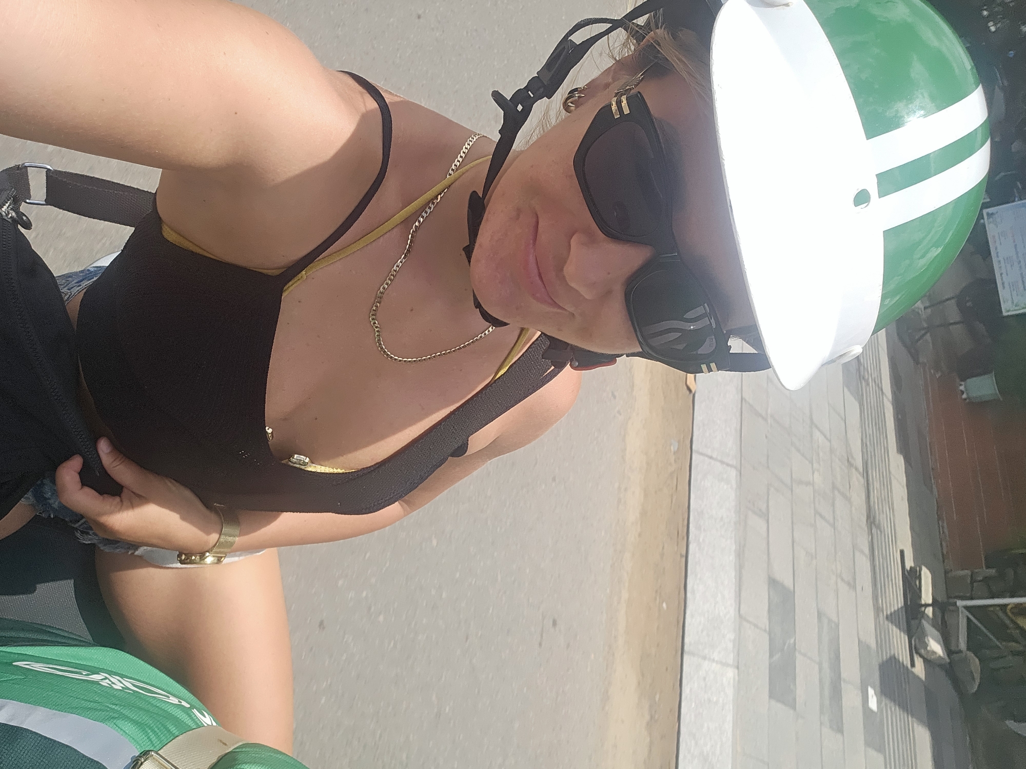 Motorcycle selfie on the move in Phu Thuy Ward