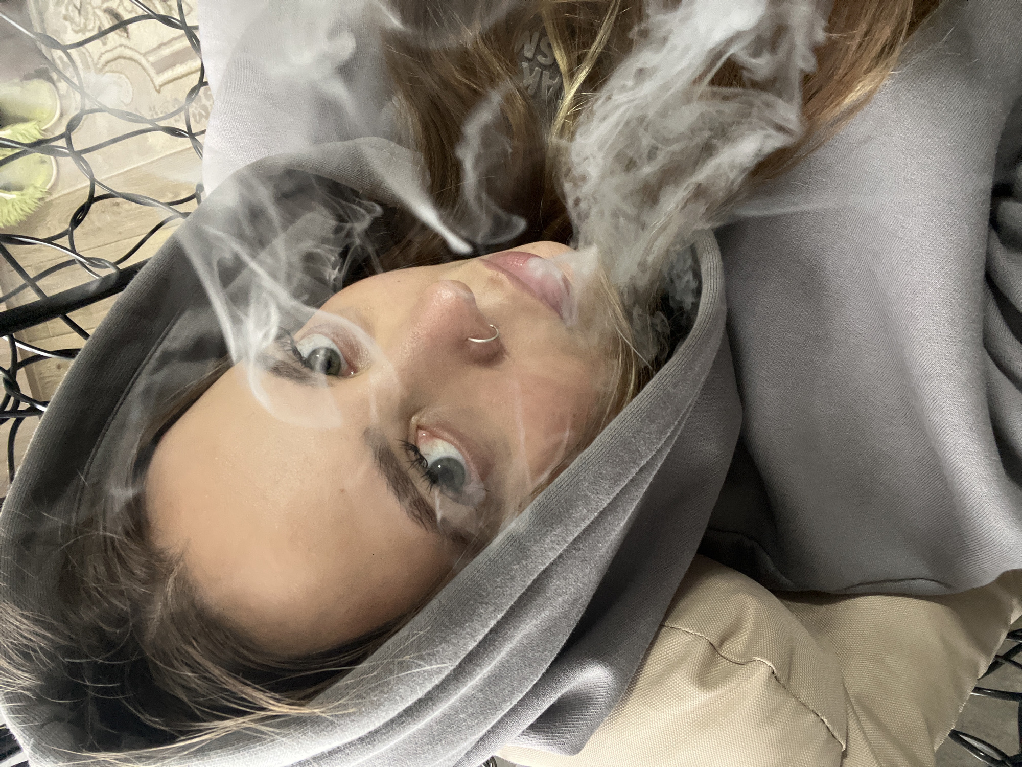 Young woman documents afternoon vaping session in rural Russia
