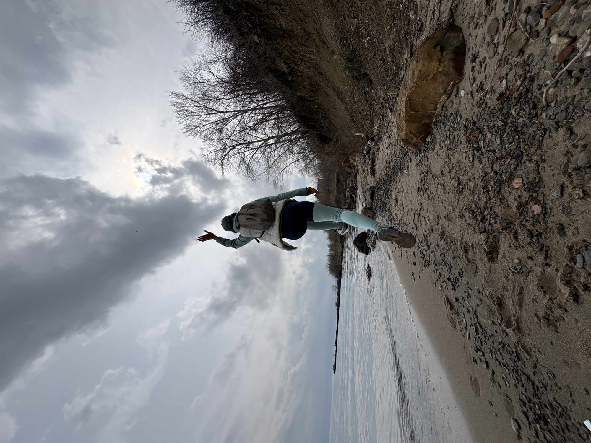Woman exercises on Volga River beach in Ulyanovsk