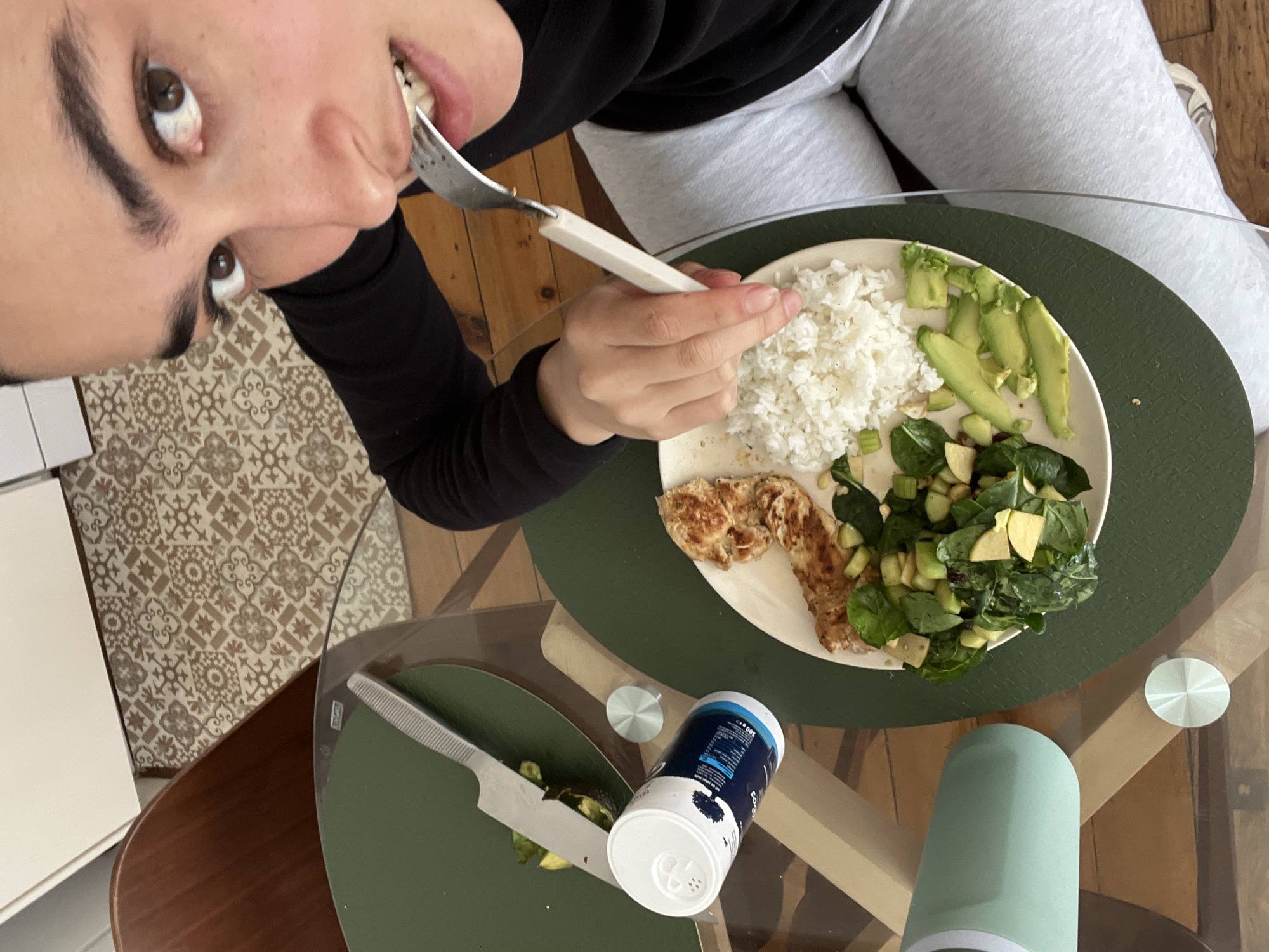 Person enjoys lunch in elegant Lyon apartment