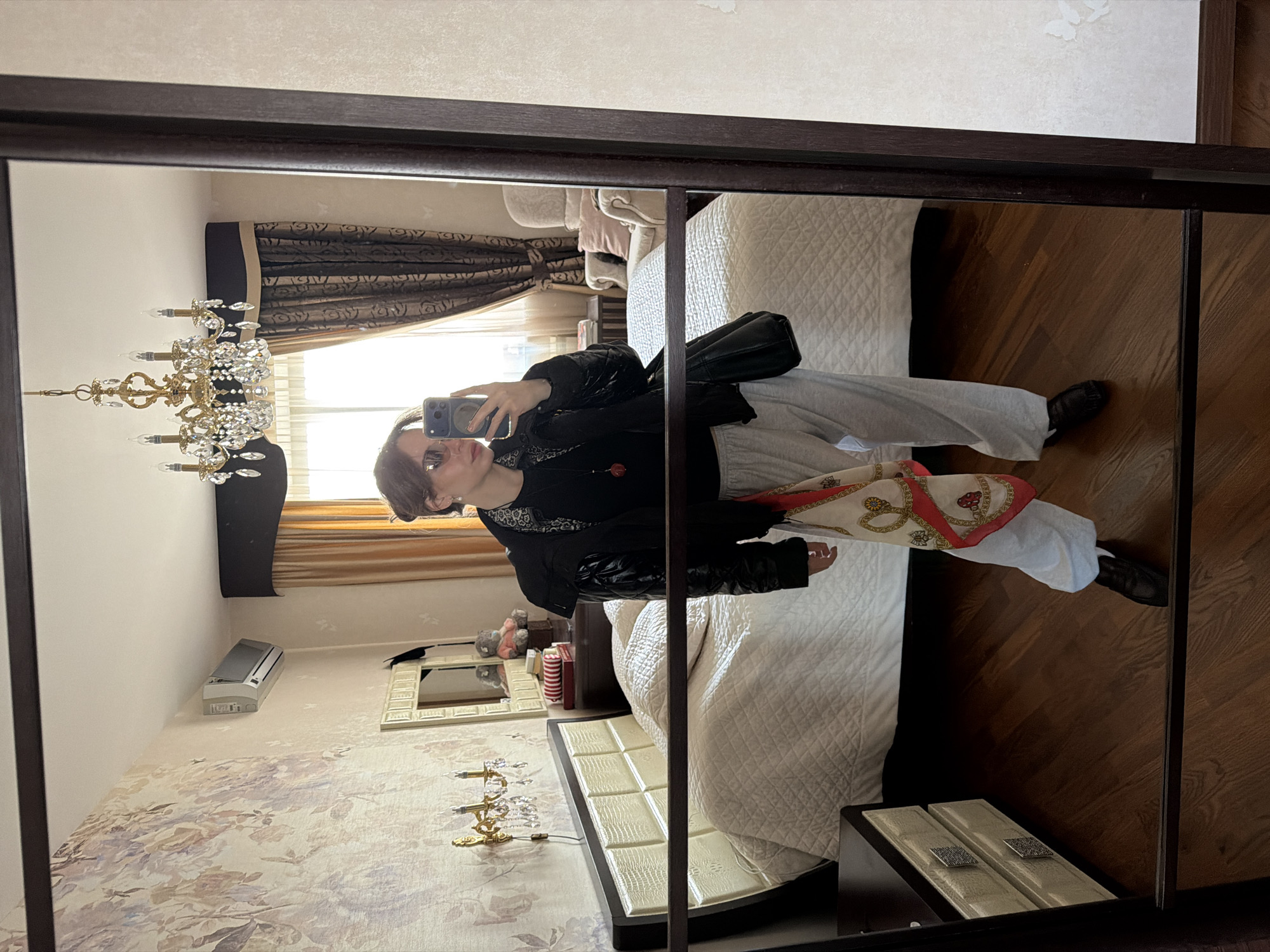 Woman takes selfies in elevator in Khimki, Russia