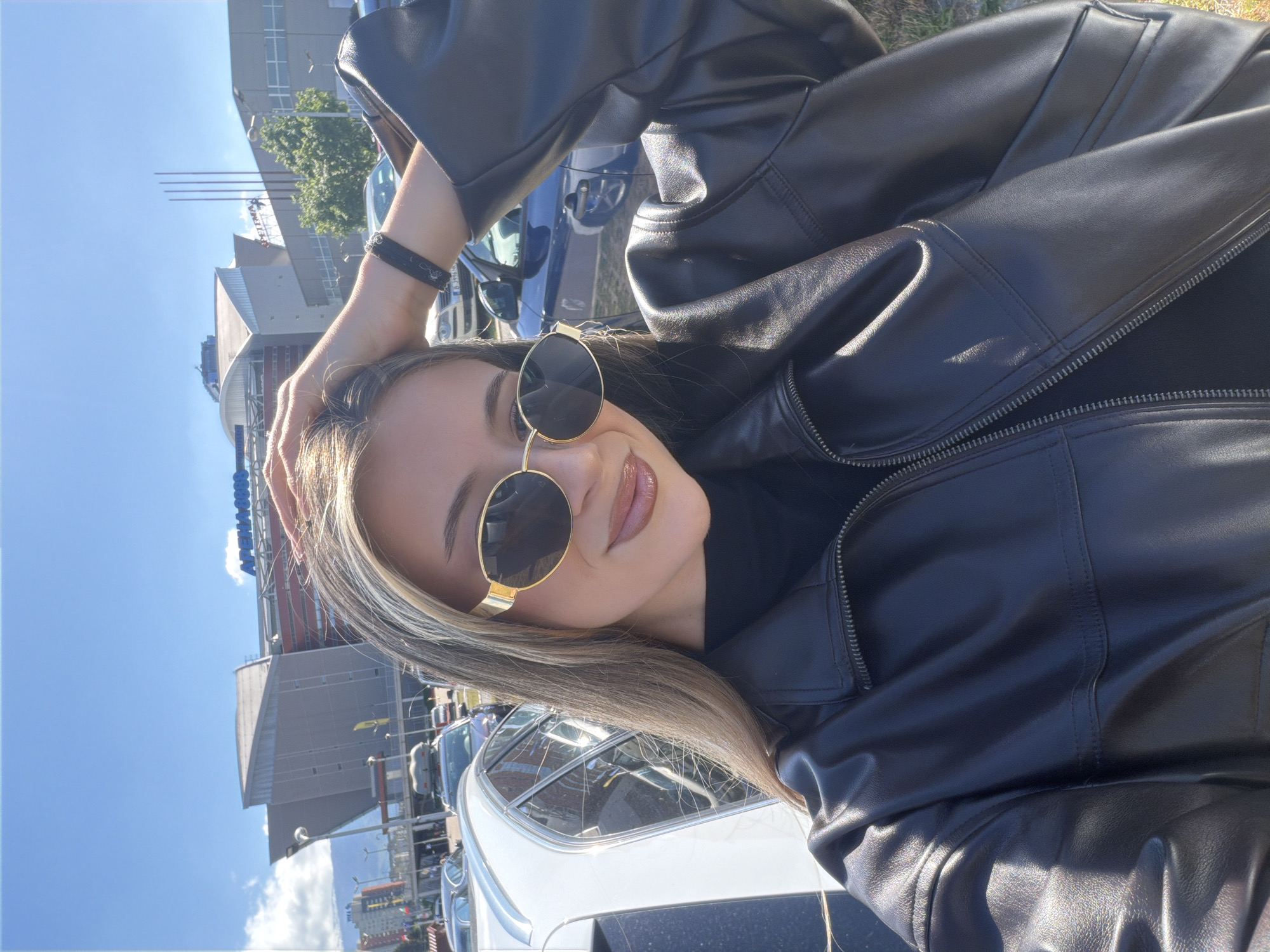 Woman takes selfies outside Arena Armeec in Sofia