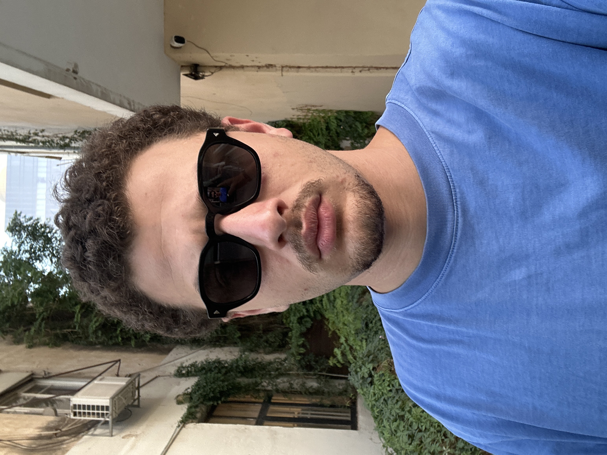 Man takes selfie outdoors in Tel Aviv