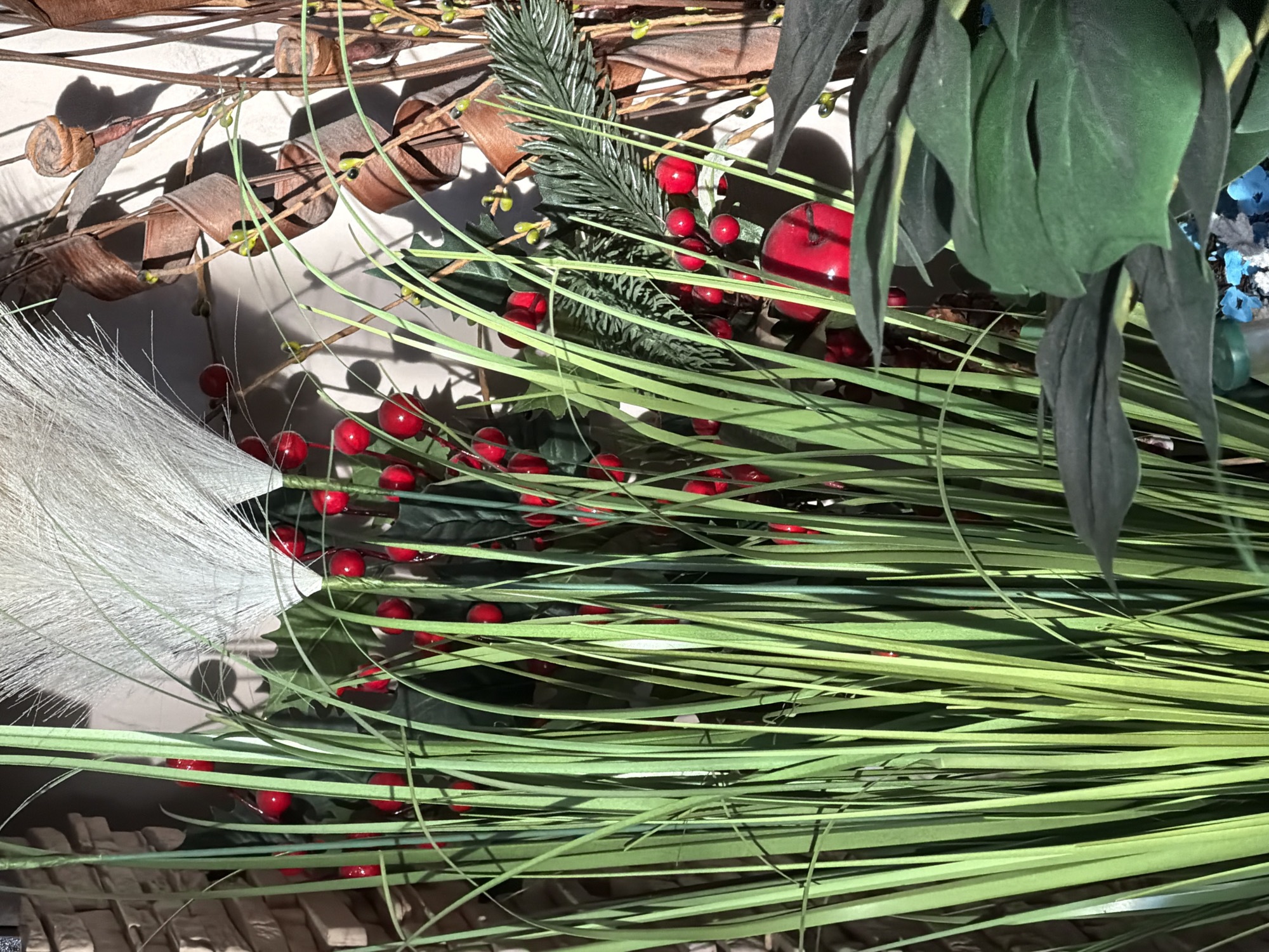 Observer documents flowers, foliage, and holiday decorations during afternoon session