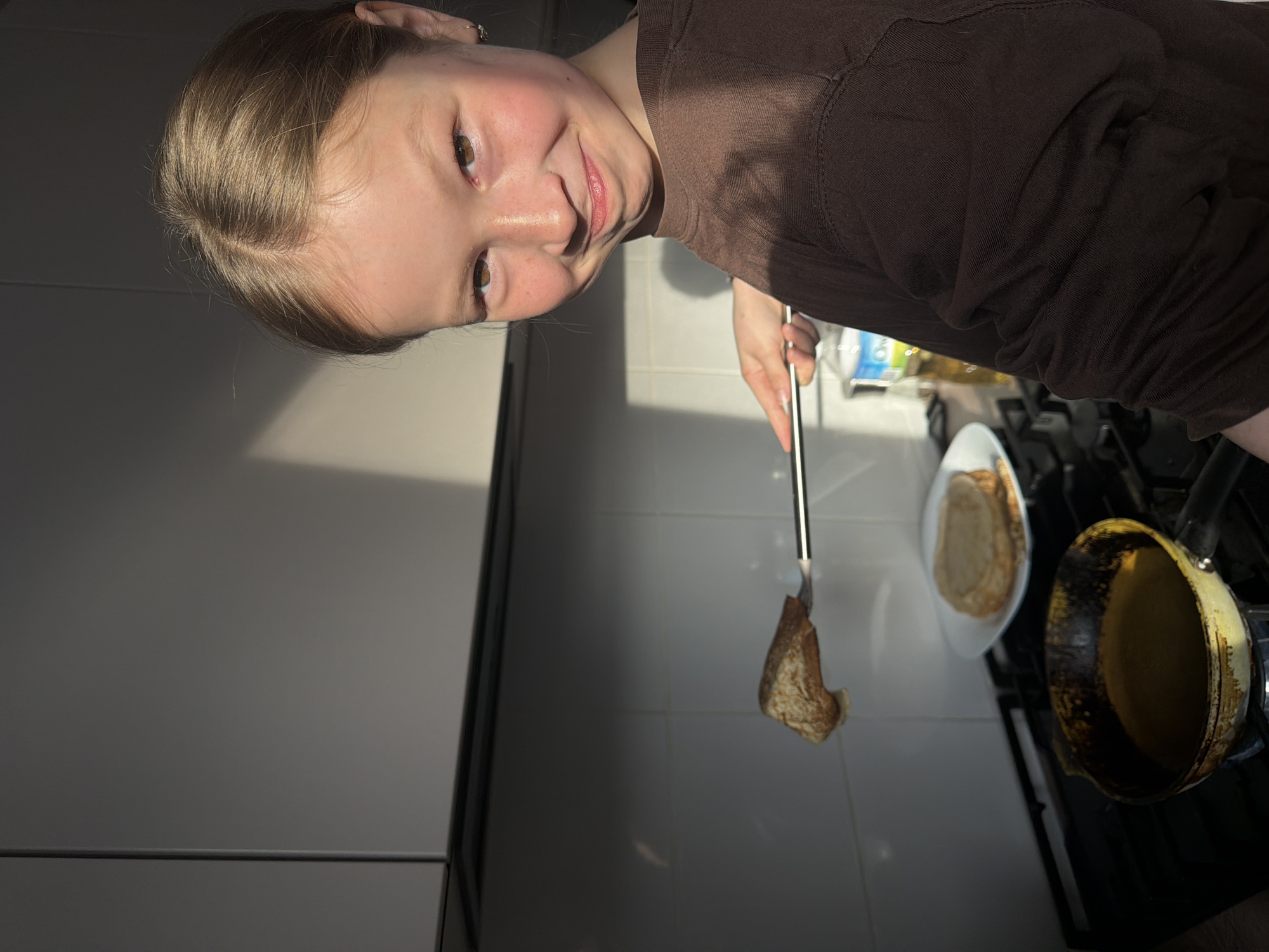Domestic activities in Markovo: pancake cooking, pet interaction, painting