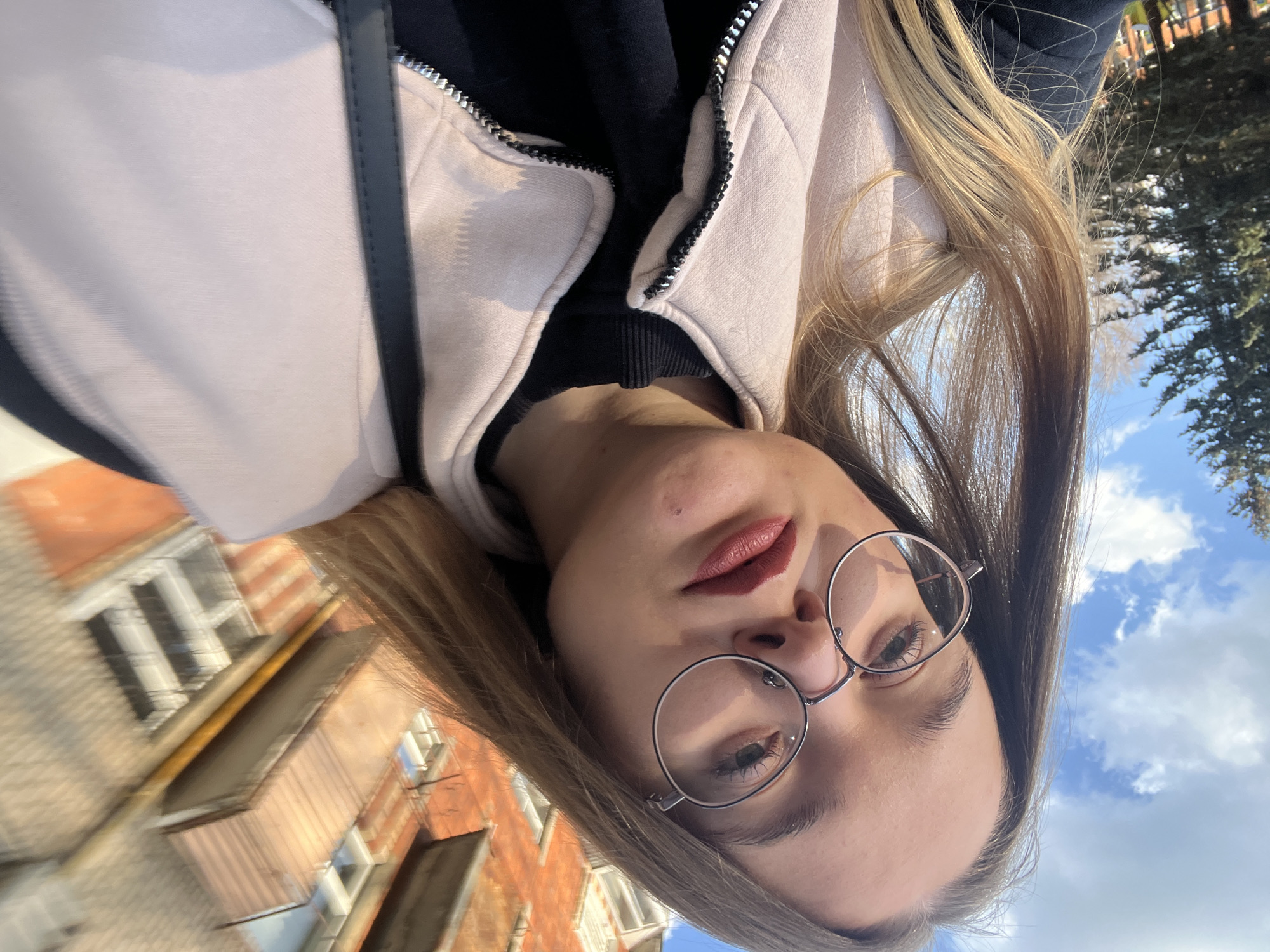 Woman takes outdoor selfie in Pushchino, Russia