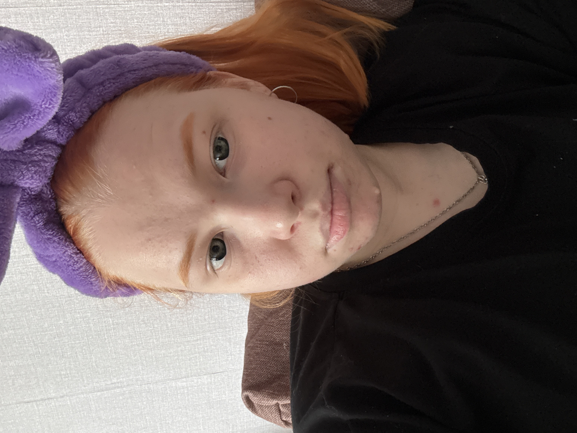 Red-haired person in bunny headband photographed in multiple poses