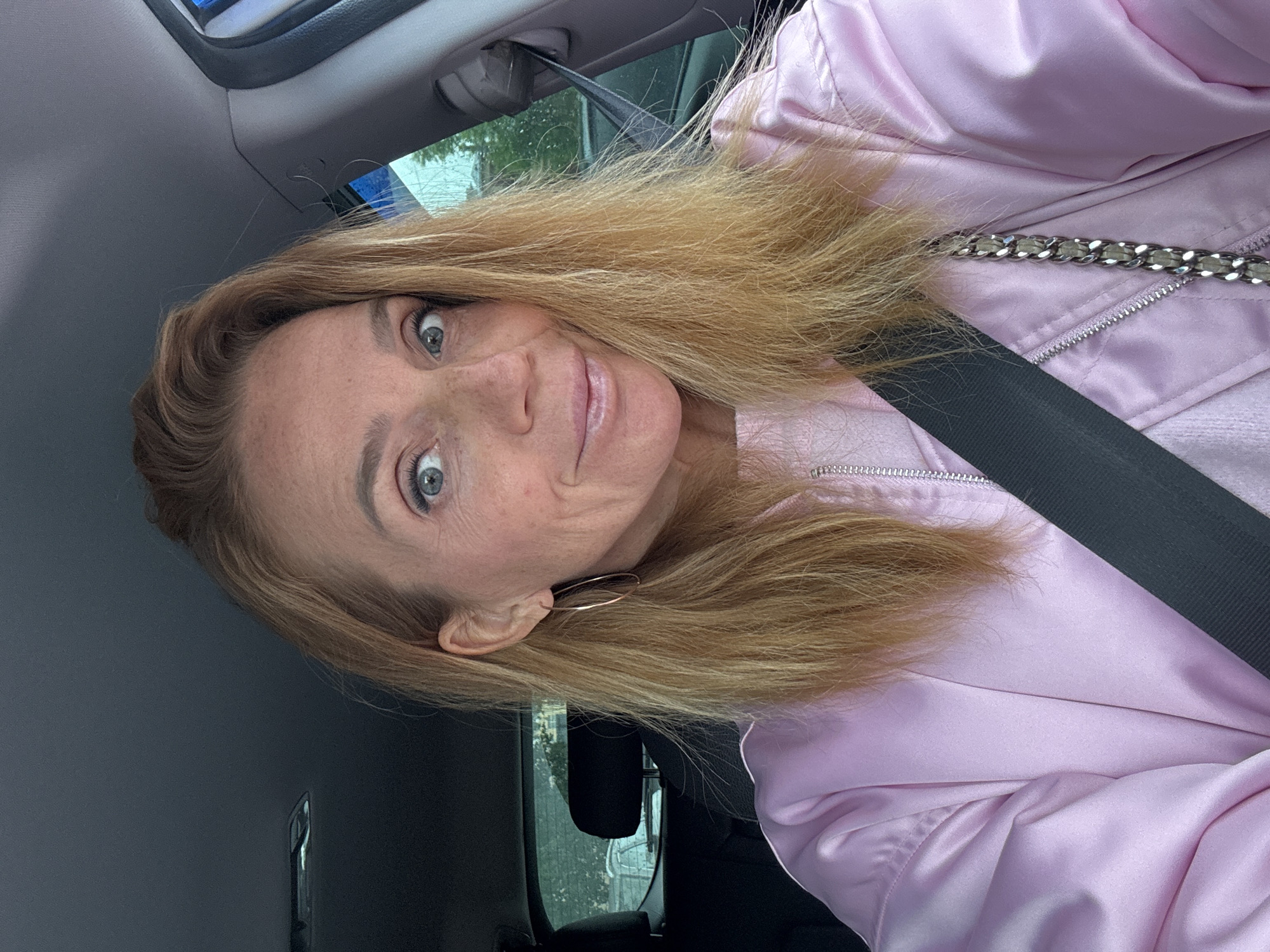 Woman in pink jacket observed in car, Saint Petersburg