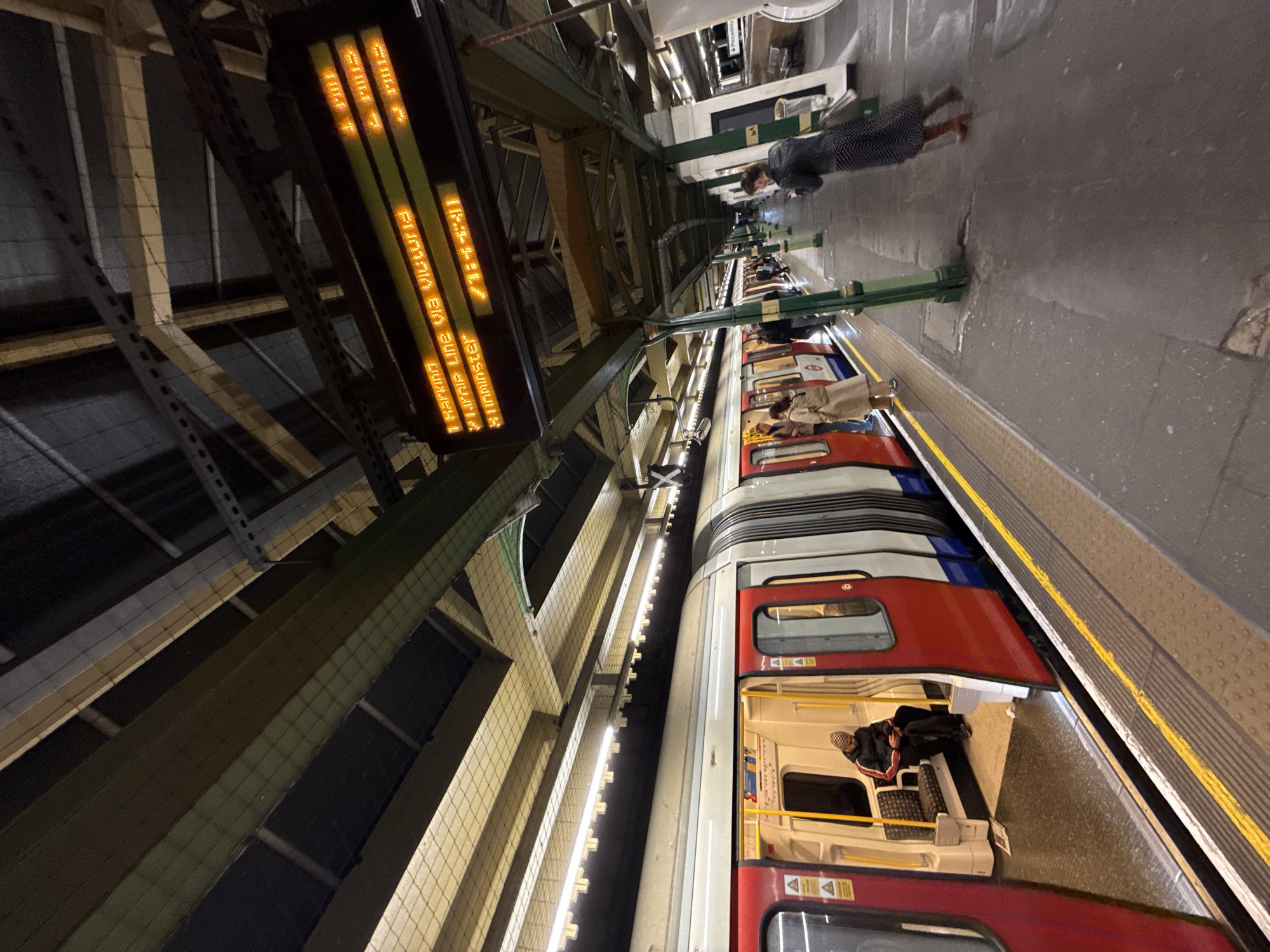 Evening commuters use London Underground service in central station