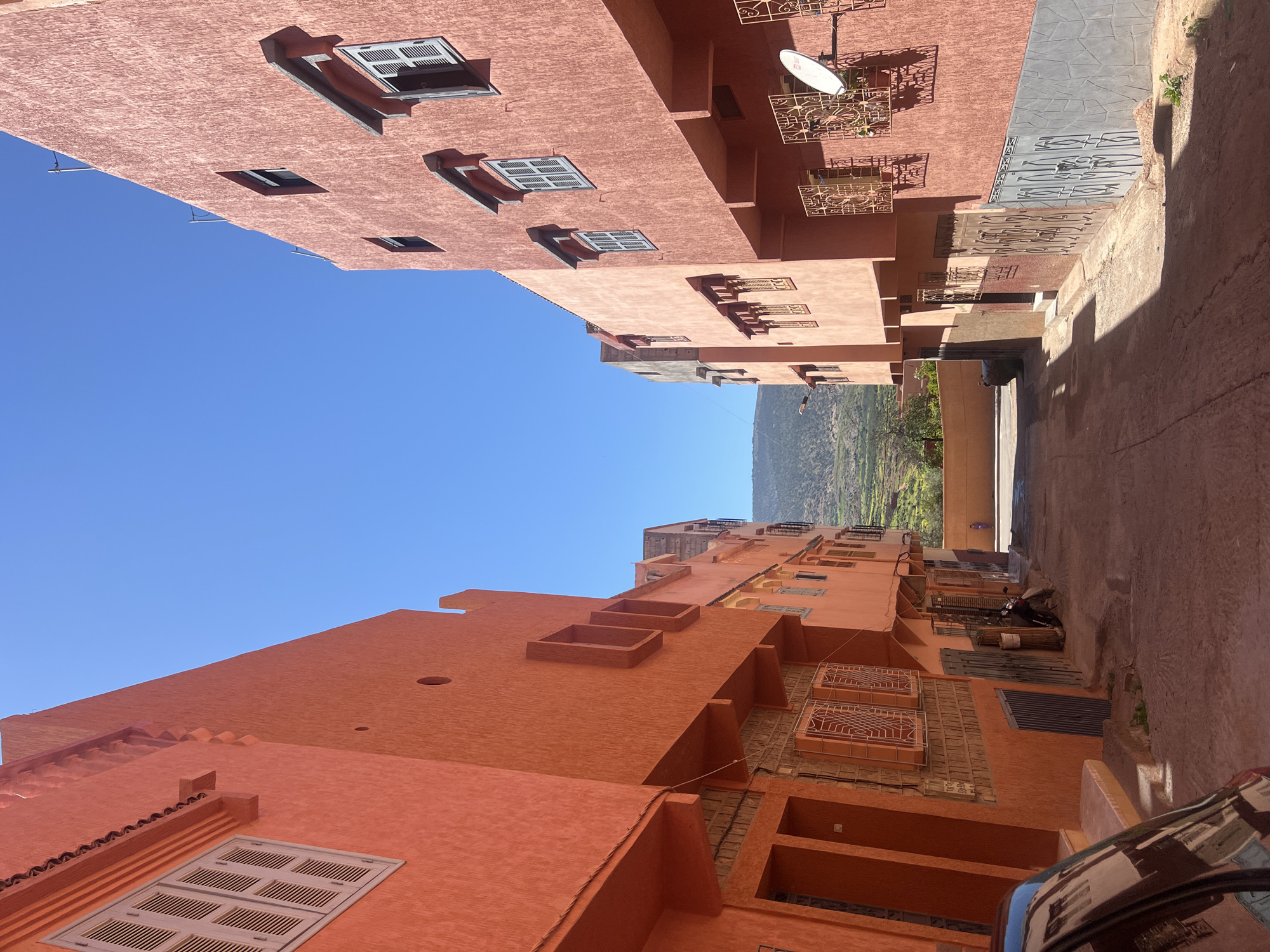 Person documents street scenes and selfies in Ouaouizert, Morocco
