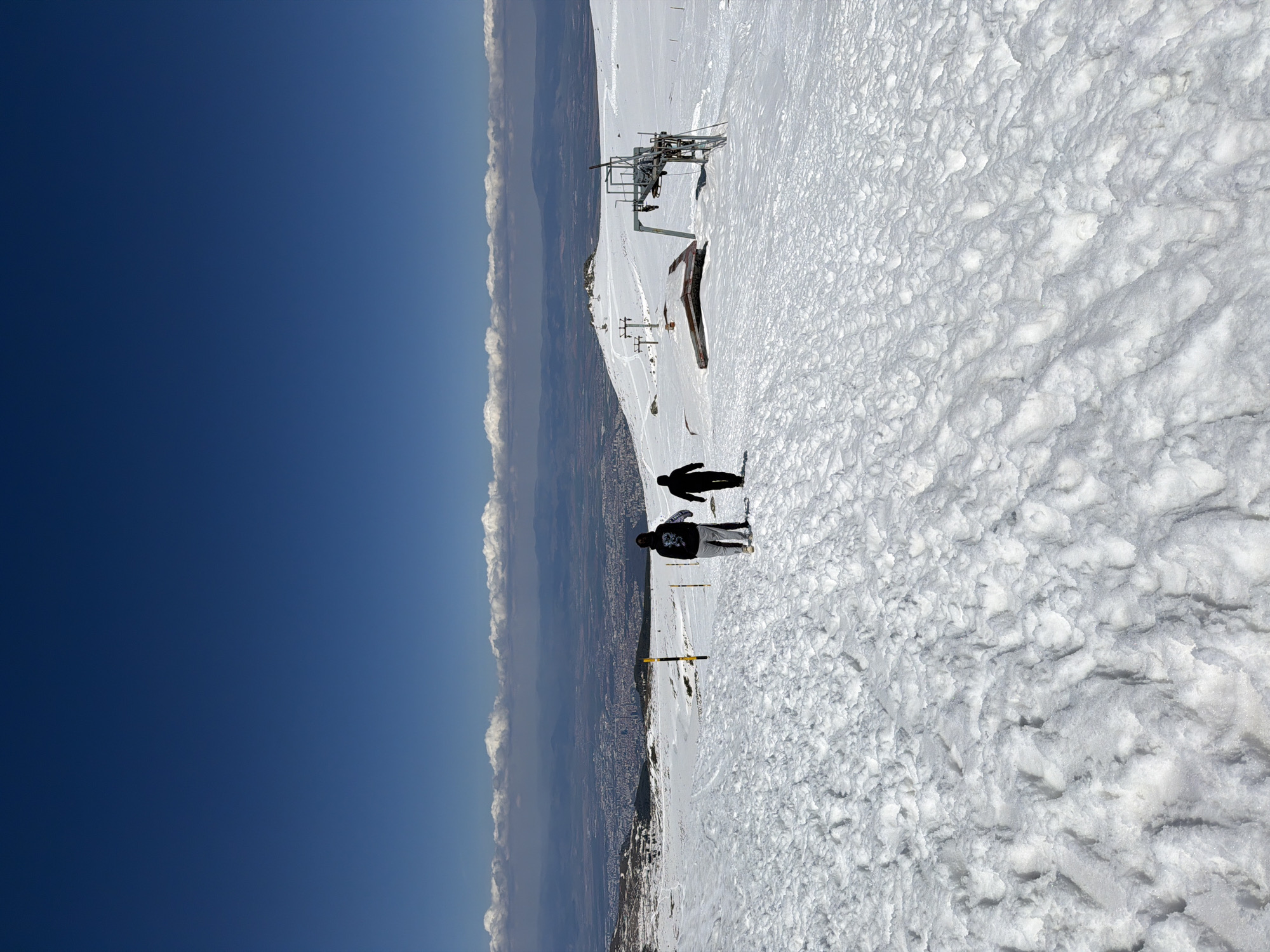Winter visitors gather on snowy mountain above Bistritsa