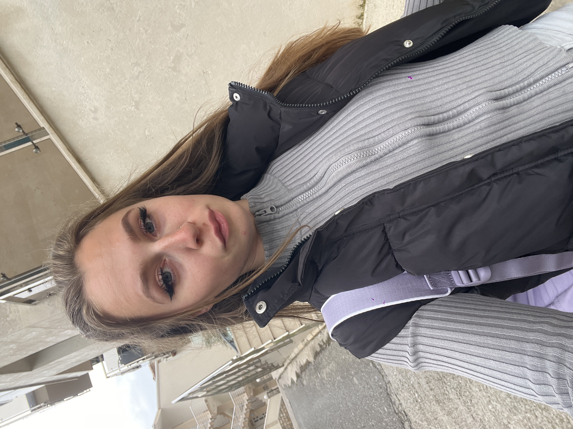 Woman takes selfie in Bečići, Montenegro